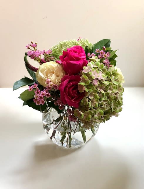 Wild and Free - A vibrant array of summer blooms to brighten up any day.  Sending thoughts of love, care or even gratitude?  This arrangement is the perfect bundle to gift.  