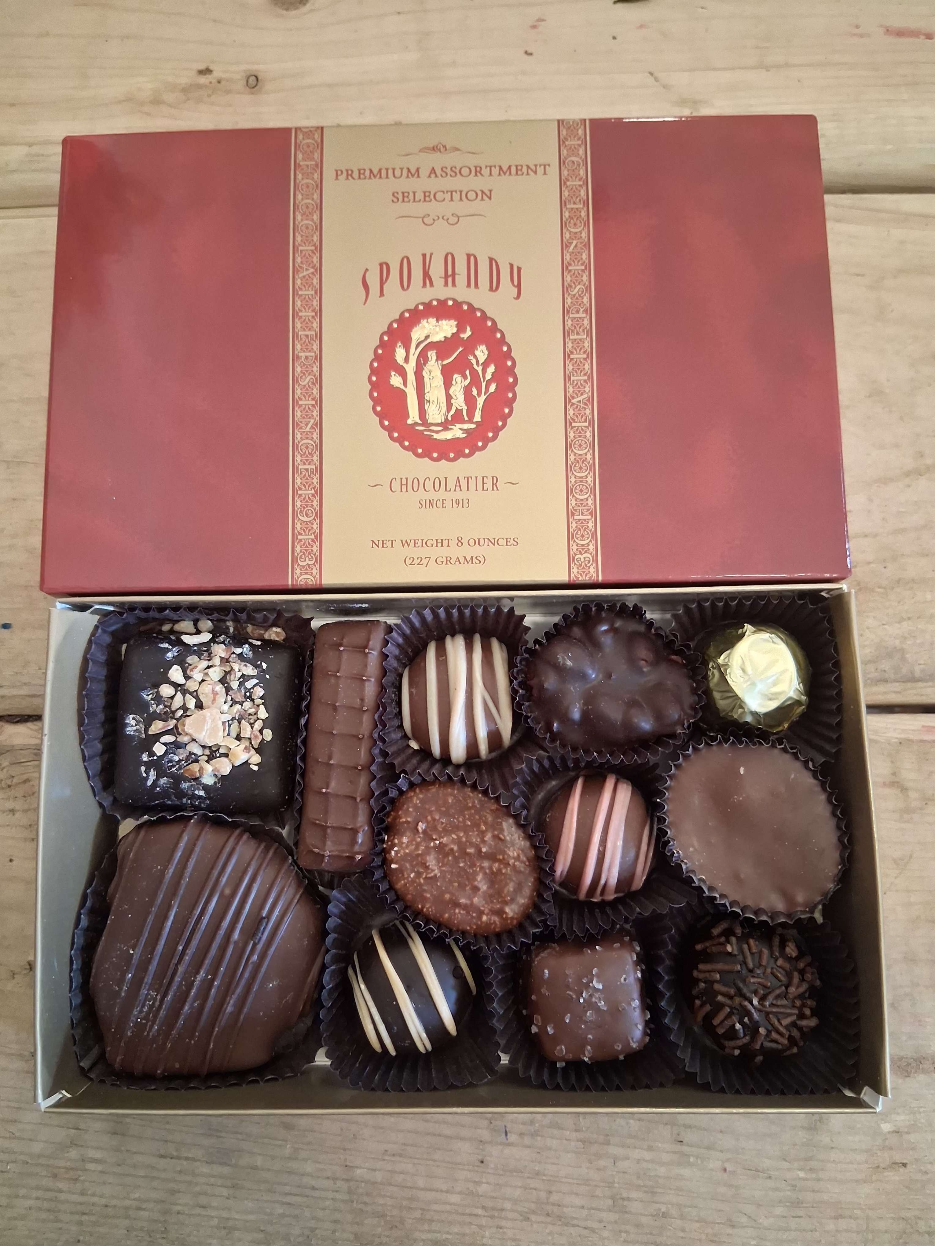 Spokandy Premium selected chocolates  - Delicious rich premium selection hand packed . Chewy caramels, flavorful soft fillings, freshly roasted nut clusters, along with other decadent specialties. Truly our  most popular hand crafted selection of only premium chocolate. 8oz gift box. Enjoy 