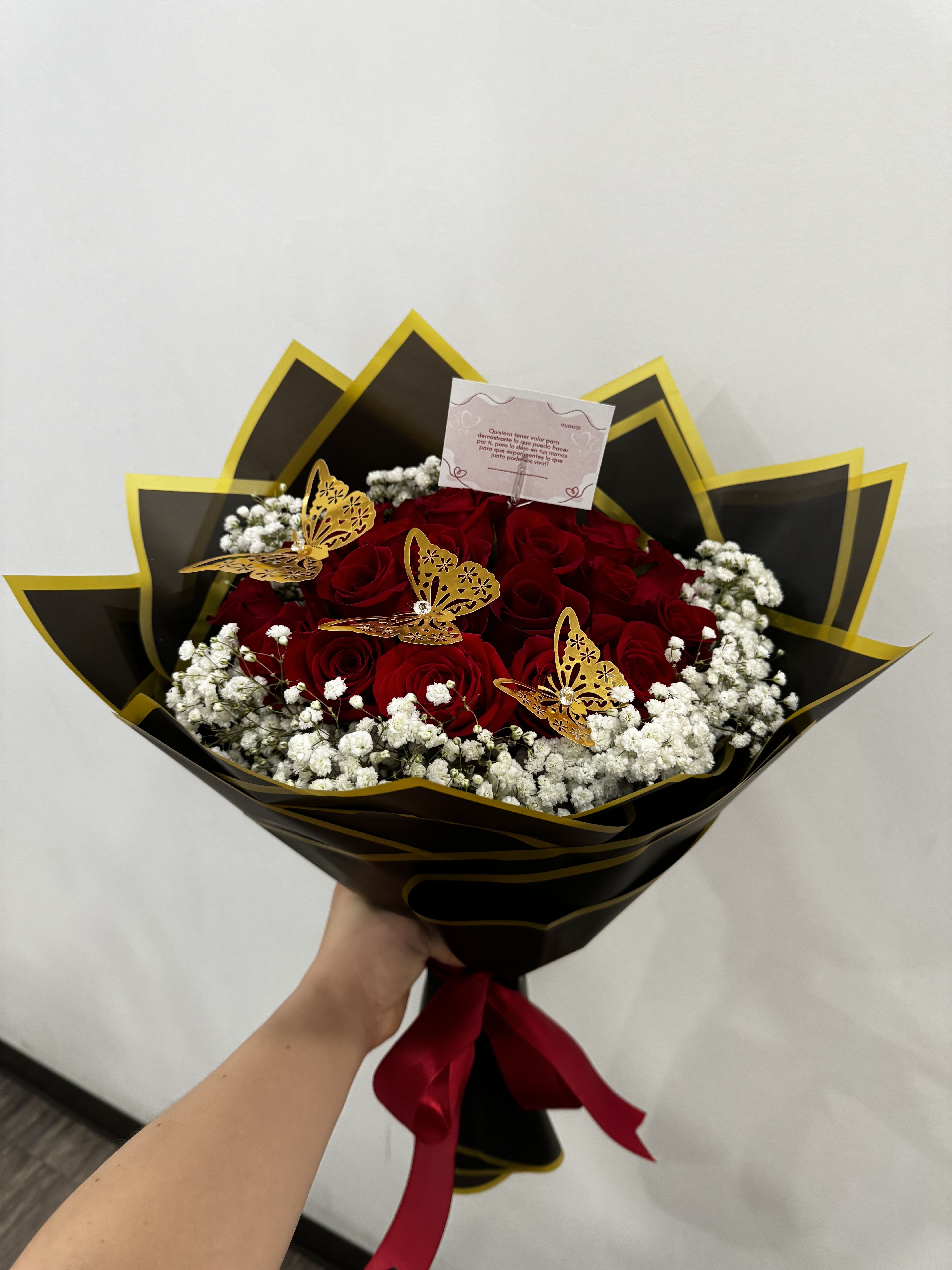 Inlove Bouquet - Radiant 24 roses adorned with delicate white baby breath, accented by three elegant butterfly toppers, all Beautifully tied with a silk bow.