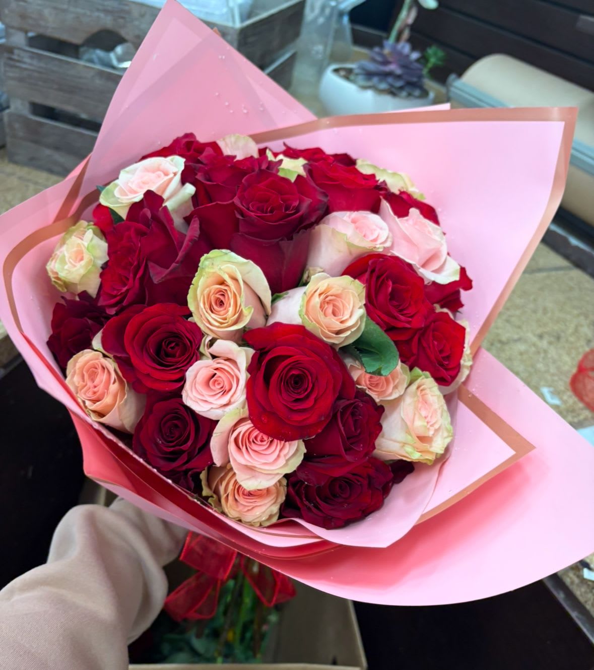 pink and red rose bouquet - 2 dozen red 2 pink roses wrapped in pink tissue with a red  bow..