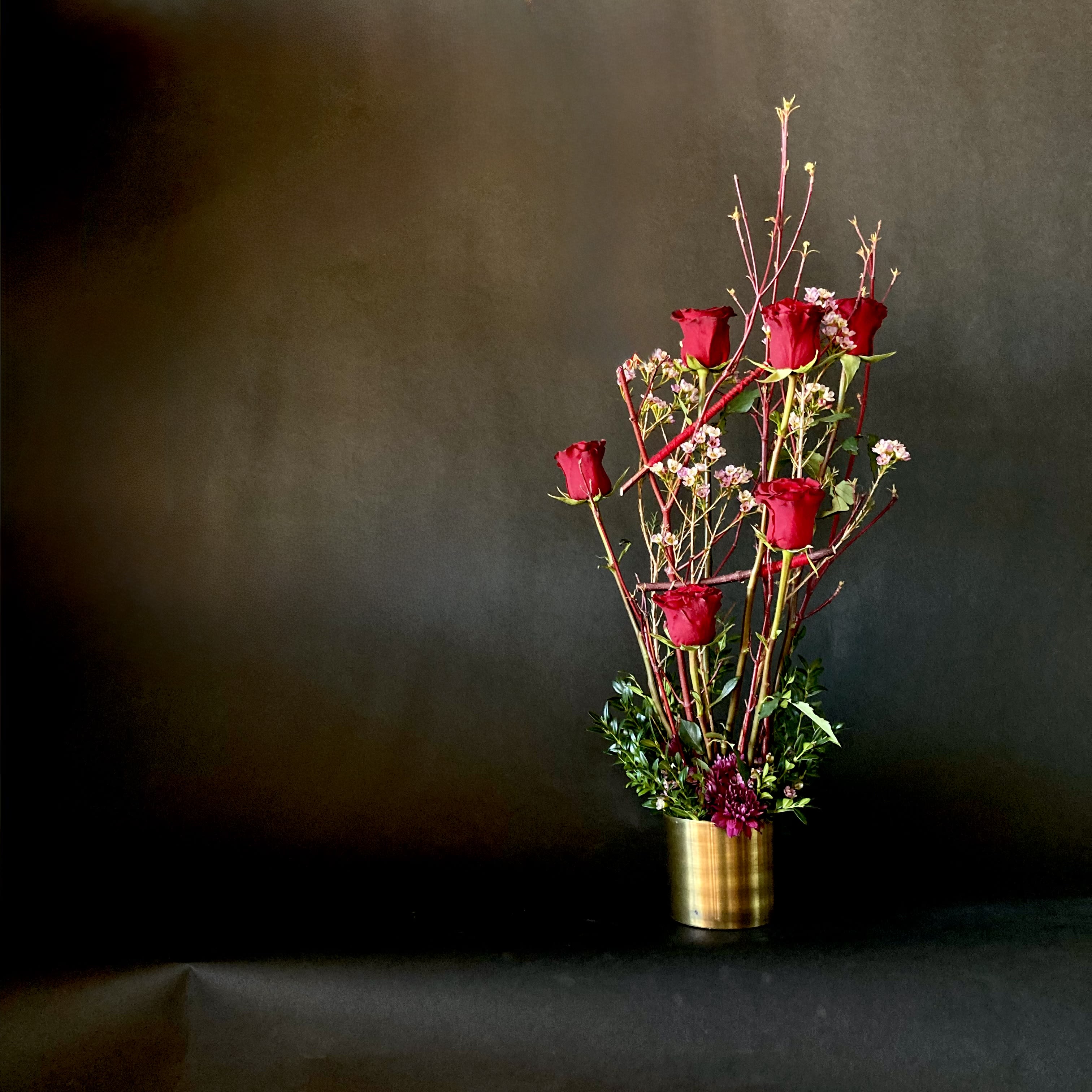 Red Roses - Half dozen red roses arranged in a metal container.  