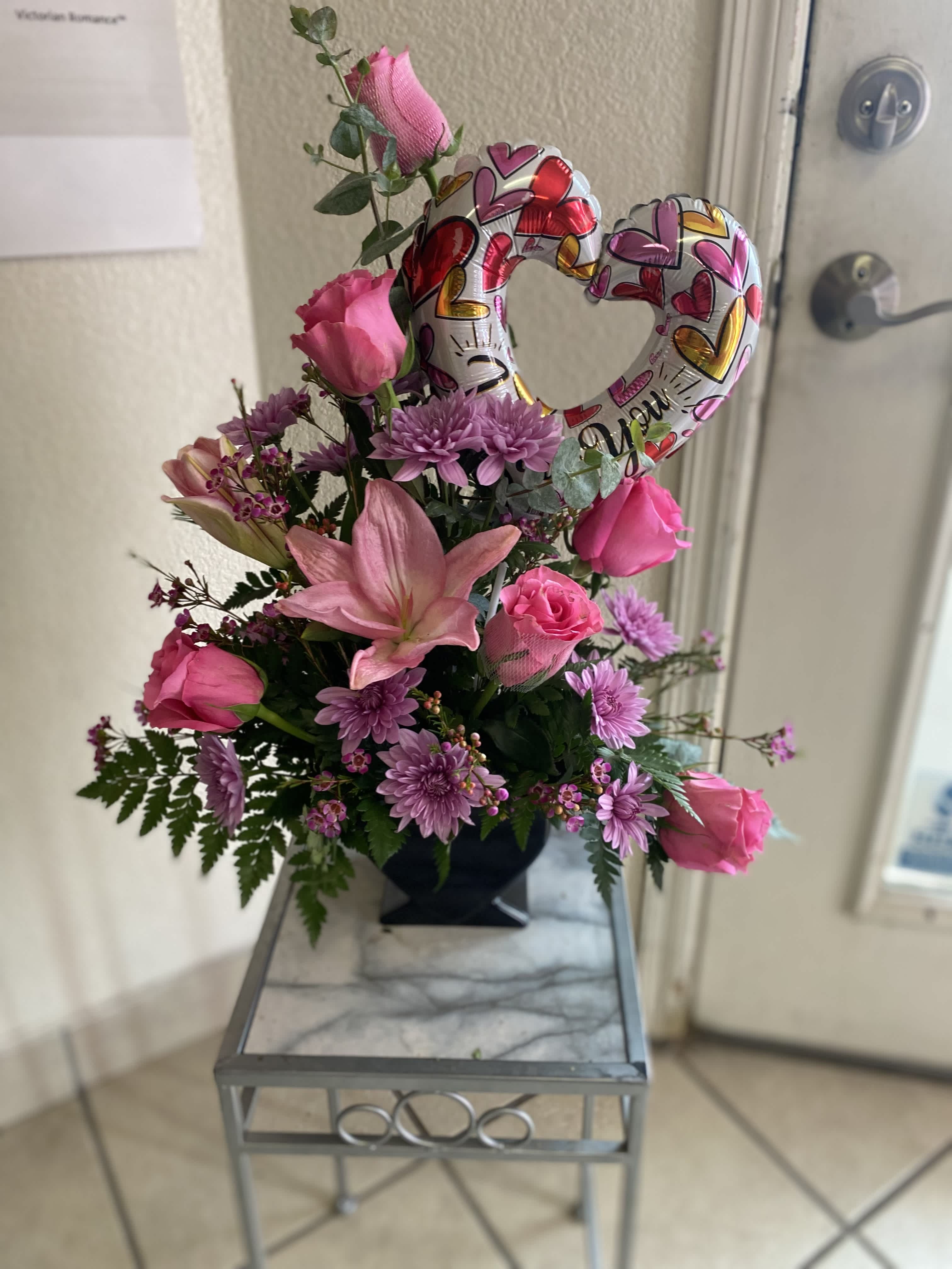 Valentines bouquet  - A unique arrangement with variety of floral arranged in a small heart vase