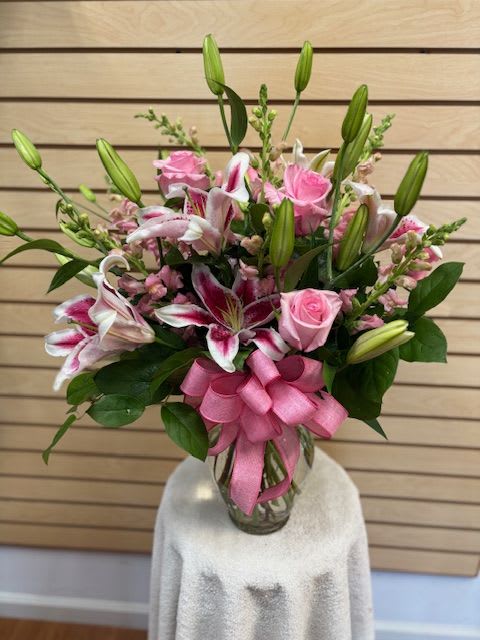 Pink Blush - Mixed cut with all pink flowers. Pink roses, stargazer, and pink snapdragons in a vase