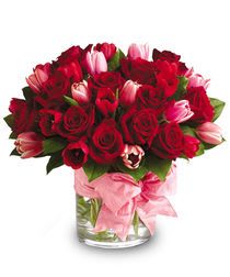 P.S. I will always love you  - Tell someone, “I love you!” with two of nature's most beautiful flowers, combined into one spectacular bouquet. Our P.S. I Love You flower bouquet features red roses for romance paired with tulips.