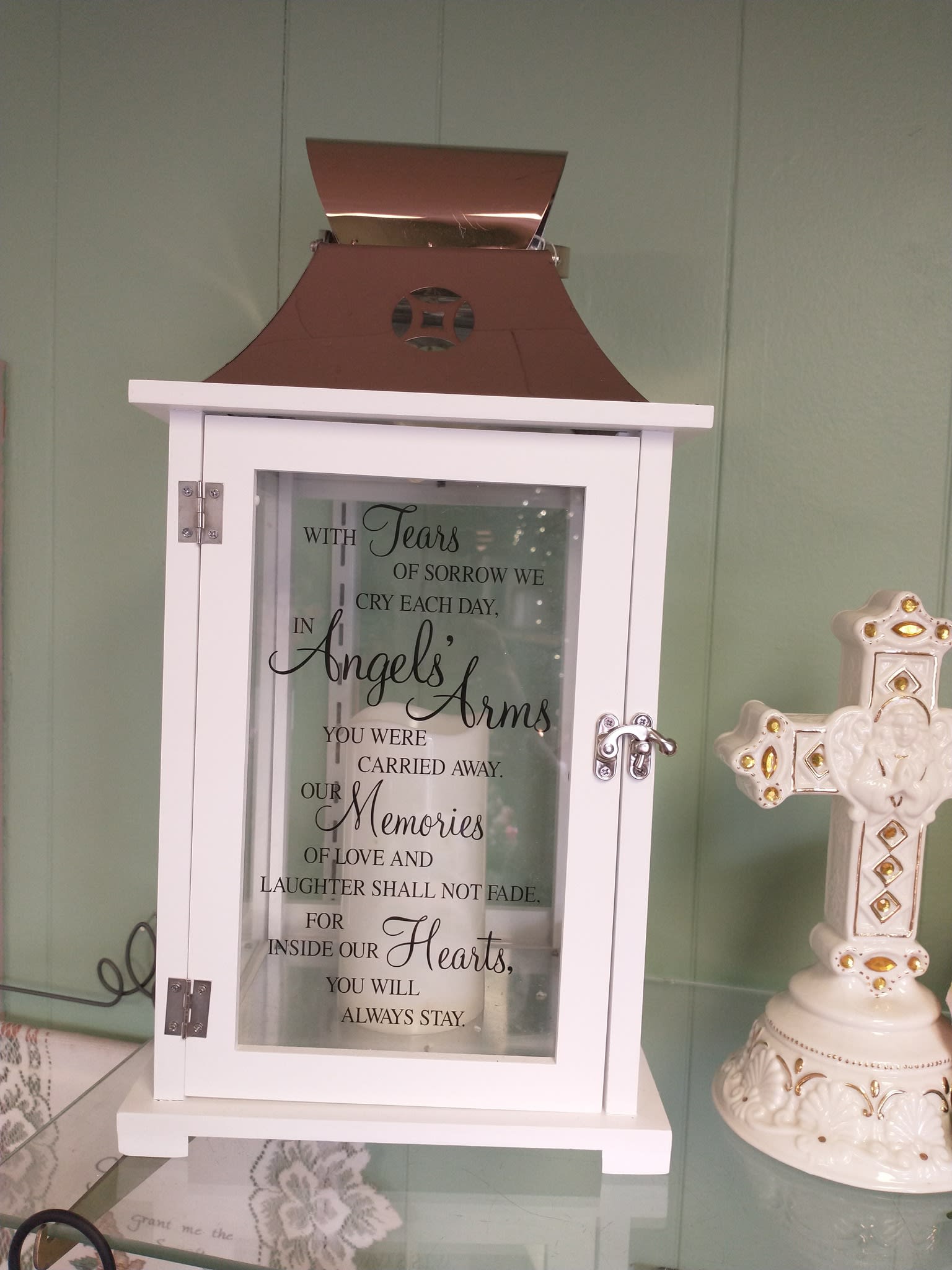 Lanterns - Light up their day with our beautiful lantern selections. The standard is Lantern with bow, The deluxe is Lantern with bow and silk hanging greens, The Premium is Lantern with bow, and Fresh Flowers. Lantern pictures vary based on availability. Questions on sizes or sayings available, give us a call (937)492-4965