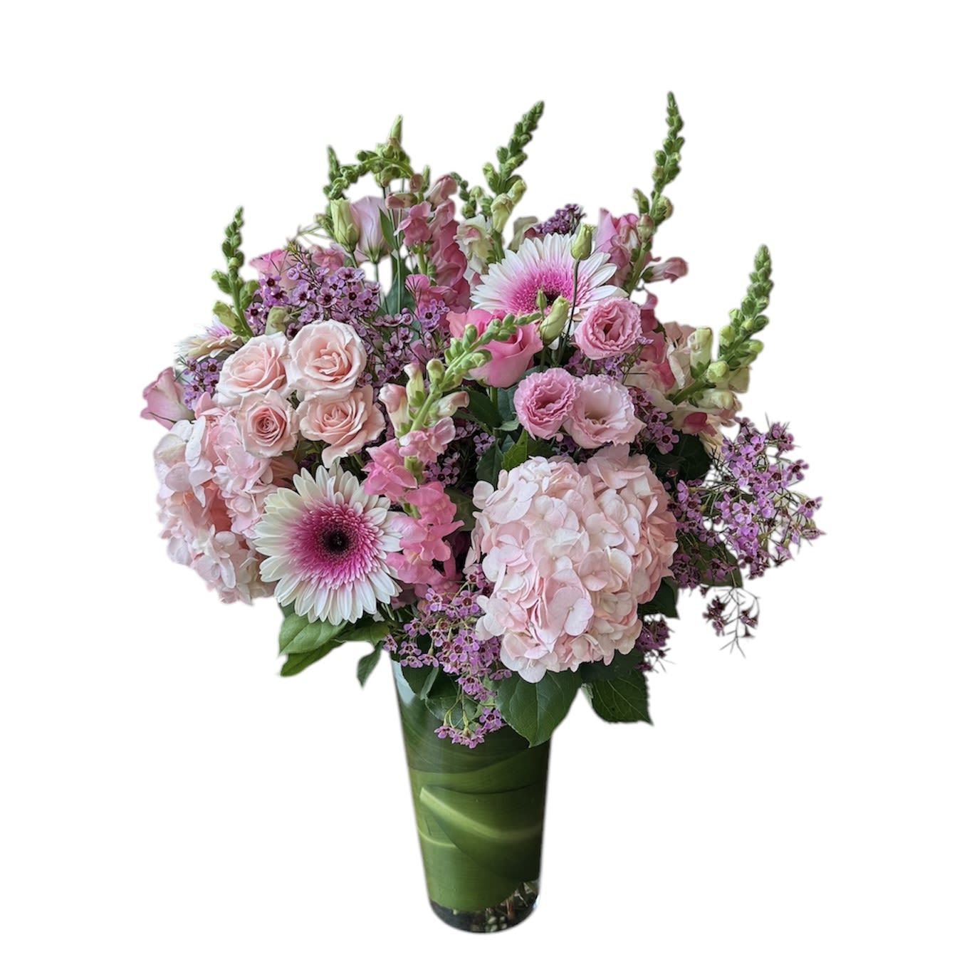 Large Arrangement, Full  - Pink hydrangeas, pink gerbera daisy, pink roses, pink spray roses, pink snapdragons, pink lisianthus, wax flower designed in a large, tall vase. As shown in photo.
