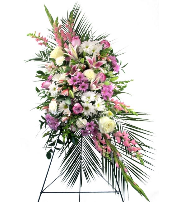 Sweet Dreams Sympathy Standing Spray - Pink, lavender, cream and white flowers are hand-arranged along with airy greens to create a meaningful symbol of love and remembrance. Pictured flowers include Roses, Stargazer Lilies, Alstroemeria, Snapdragons, Gladiolas, Daisies, Carnations, Baby's Breath or similar seasonal favorites.  A beautiful testimonial to a beautiful life, our Sweet Dreams Sympathy Spray is appropriate for wakes, funerals, and memorial services. The flowers measure approximately 25in (W) x 50in (H), for a total of approximately 80 inches (H) when displayed on the easel stand. Deluxe and Premium styles are larger and feature more premium blooms.  Please Note: This is a special order floral arrangement. Place your order online and allow at least 1-2 business days for order processing. Please give us a call at 619-237-8842 for same day delivery options. Some substitutions may be necessary due to seasonal availability of certain blooms used in this composition. We can assure you that your order will only be upgraded with same or higher value premium blooms if a substitution is unavoidable.