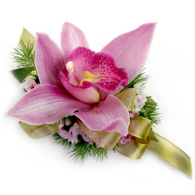 Cymbidium Orchid Corsage (Wristlet) - A single Cymbidium Orchid bloom sits atop wax flowers in this traditional design. This wristlet corsage is available in three colors.  Standard - Pink Cymbidium Orchid Wrist Corsage  Deluxe - White Cymbidium Orchid Wrist Corsage  Premium - Green Cymbidium Orchid Wrist Corsage  Our wristlet corsages are made to order and can match any dress color and style. Please call one of our friendly sales associates at 619-237-8842 to discuss color and size options.