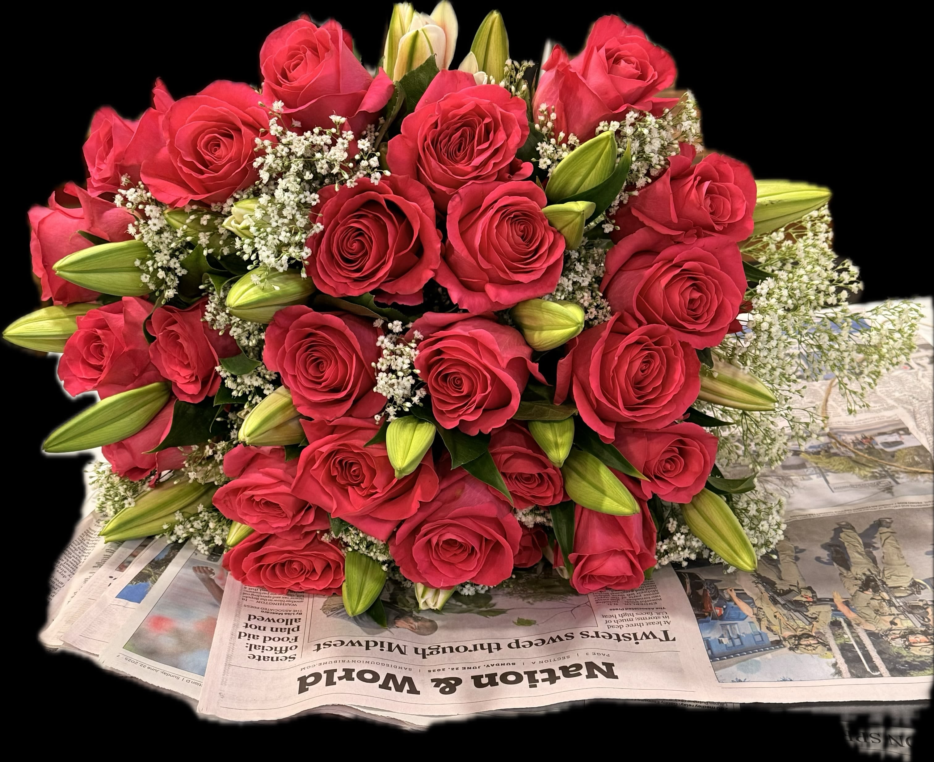 Eternal Desire - This striking hand-tied bouquet features a lush arrangement of vibrant hot pink roses paired beautifully with unopened white lily buds, symbolizing passion, purity, and new beginnings. Accents of delicate baby’s breath add a soft, romantic touch, balancing the boldness of the roses. The composition is artfully rounded, creating a full, luxurious look that’s perfect for special occasions such as anniversaries, weddings, or romantic gestures. Featured  arrangement $ 298.00 please specify if you like different color roses (orange, pink, red, white, peach, lavender, yellow ) ( 24 roses,10 lilies,10 baby’s breath) 