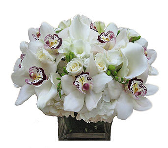 North Shore - All white, orchids, hydrangea, roses, freesia, callas