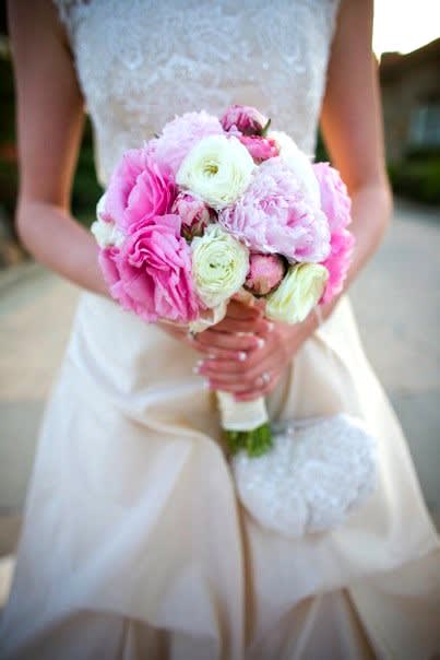 Peonies and Lizzy Bridal Bouquet - One of the most wonderful, splendid, romantic, delicate and soft type of wedding flowers that a bride can choose to emphasize her femininity and natural beauty is the lovely peony. The scent of a peony wedding bouquet is absolutely enchanting and heart wining. This bridal bouquet features Pink Peonies and White Lisianthus.  Deluxe package includes both Bridal and Toss Bouquet  All of our wedding work is custom, and we can create any bouquet you've always wanted. Contact us online or call us at 619-237-8842 to discuss color options or to schedule a complimentary wedding consultation with one of our wedding designers; you will be glad you did!