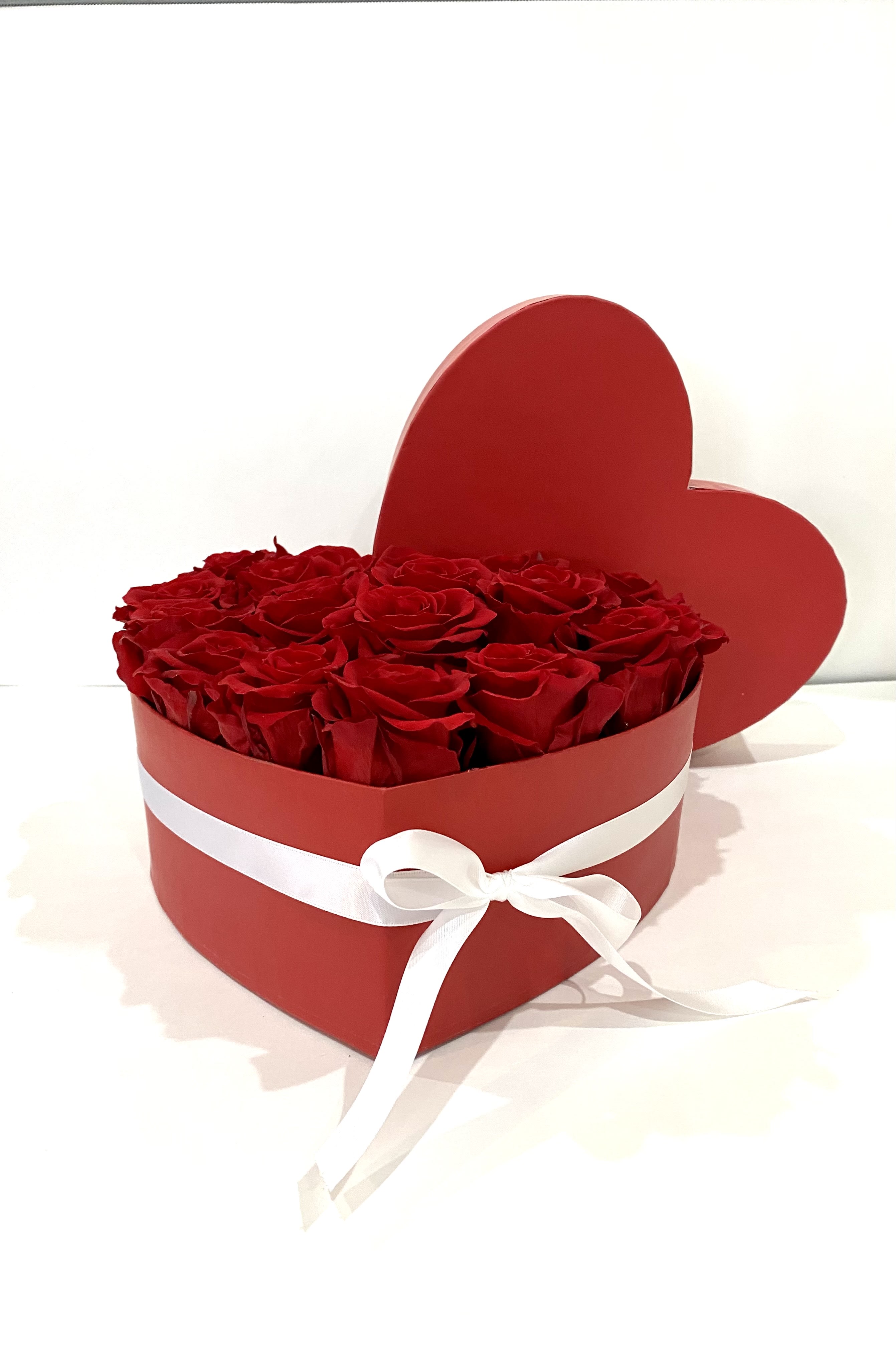Bed of roses - Preserved roses in a heart shaped box. Placed in a vase or on a shelf, you can expect your preserved roses to last one to three years.