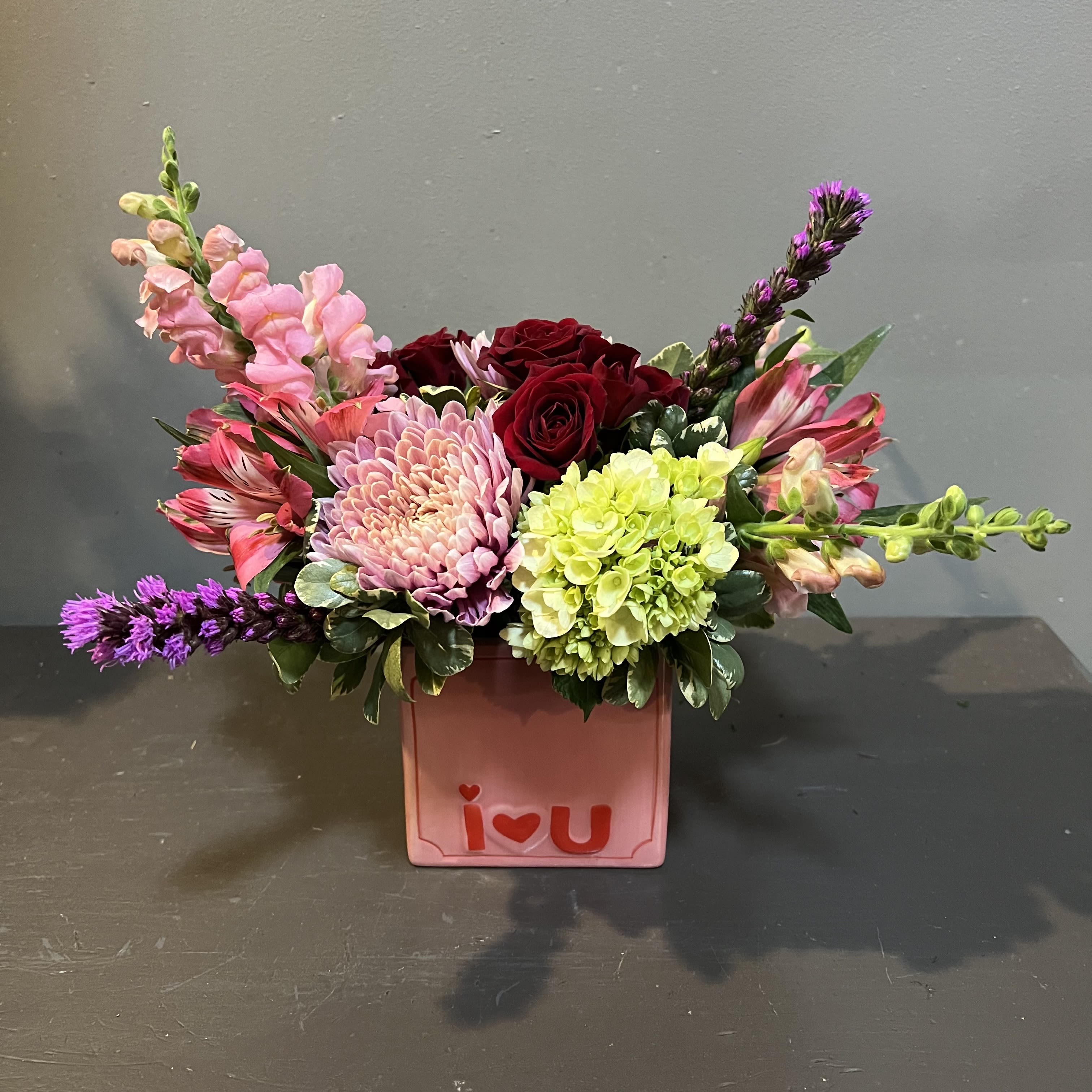 I<3U - A lil' cutesy bouquet for your Valentine!  Approx. 12"Tx12"W and arrives in a keepsake vase.