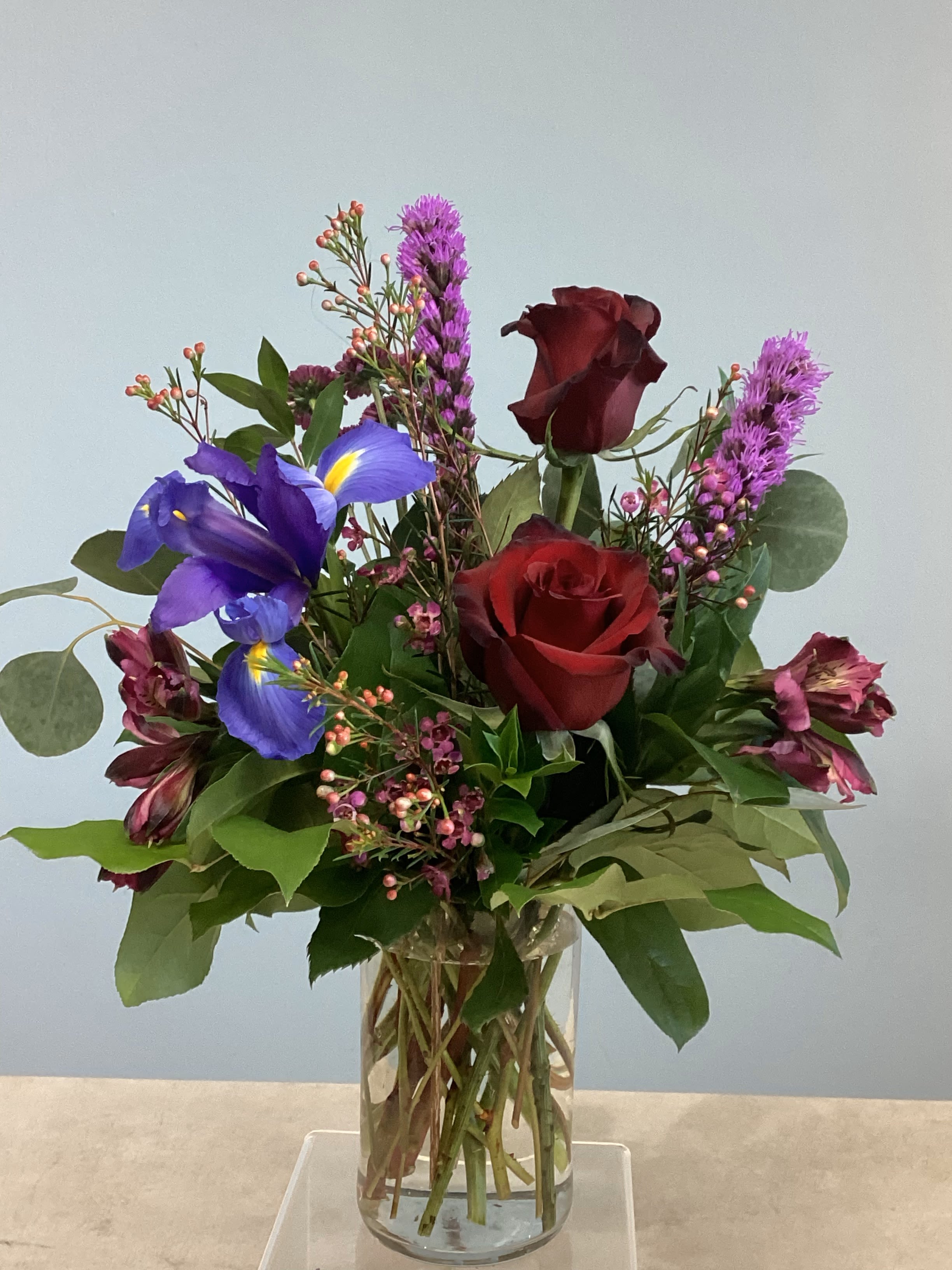 V-1 - A romantic mix of liatris roses, iris, and other flowers. 