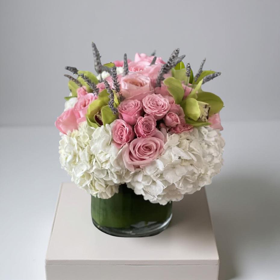 Blush Elegance - This floral arrangement exudes romance and sophistication with a beautiful  blend of soft pink,white, and green tones.