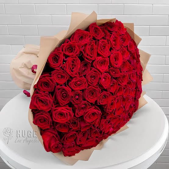 Heart on Fire - A breathtaking arrangement crafted entirely of luxurious roses. Bold, passionate, and unforgettable, this statement piece says “I love you” in the most dramatic way — perfect for grand romantic gestures, proposals, or anniversaries that deserve nothing less than extraordinary.  Standard four dozen, deluxe five dozen, premium six roses. 