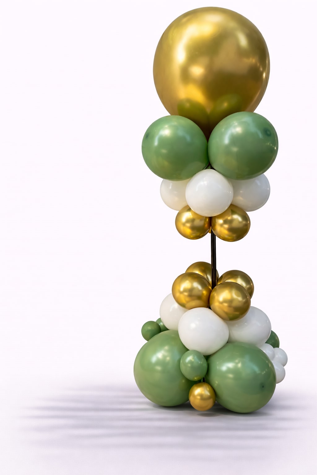 Sage &amp; Gold Elegance Centerpiece  - This minimalist balloon arrangement features a refined mix of metallic gold, soft sage green, and ivory tones, designed in a clean vertical style. The structured base and elegant color palette create a modern, timeless look—ideal for upscale celebrations, corporate events, or sophisticated birthday décor.