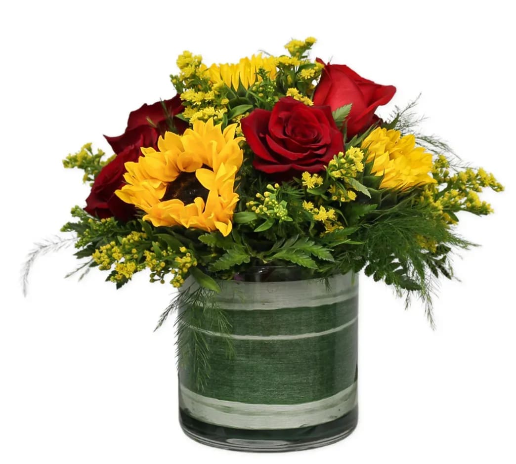 Dazzling Sunshine  - This Compact design includes bright sunflowers with black center, explorer red roses, with golden glory solidago. 