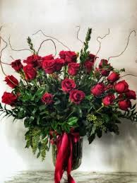 Love me Tender  2 Dozen  - Hand wrapped or in a vase ..  classic  long stem red roses  rhat is sure  says I love you ️. 