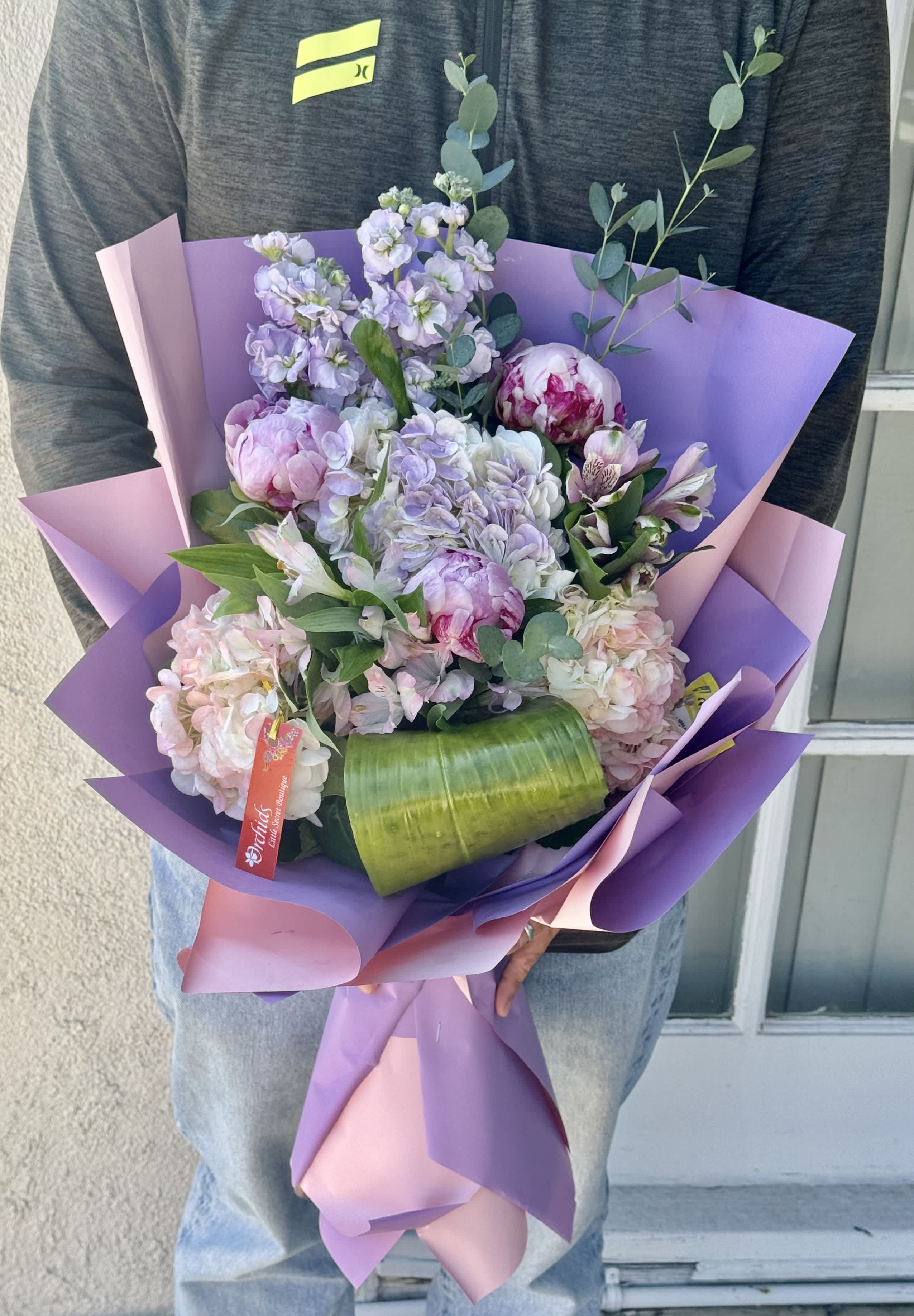 Classy Pink Lavender Peonies Hydrangea Hand Wrapped Bouquet  - Classy and girly!  this trendy  bouquet pairs with lavender, pink  hydrangeas classy pink peonies. Beautifully wrapped in in a fun pink lavender gift wrap paper, dressed with ribbon to create a wonderful gesture fitting for an anniversary Valentines day,  just because, or any other occasion!