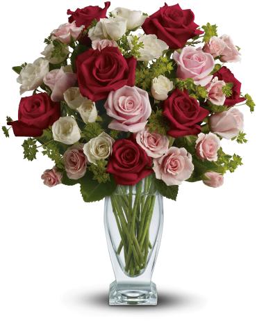 Cupid's Creation with Red Roses - A classic expression of love. Lavish your special one with a cloud of romantic roses rising from an elegant Couture Vase, exclusively from.  Iconic red and pink roses are mixed with smaller white and light pink spray roses and fresh green bupleurum. 