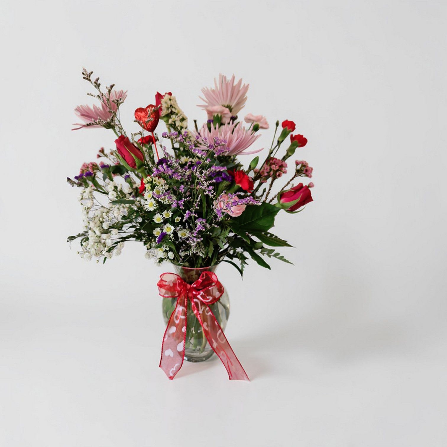 Wild About You - Fuji mums, mini carnations, wax flower, and sweetheart roses
