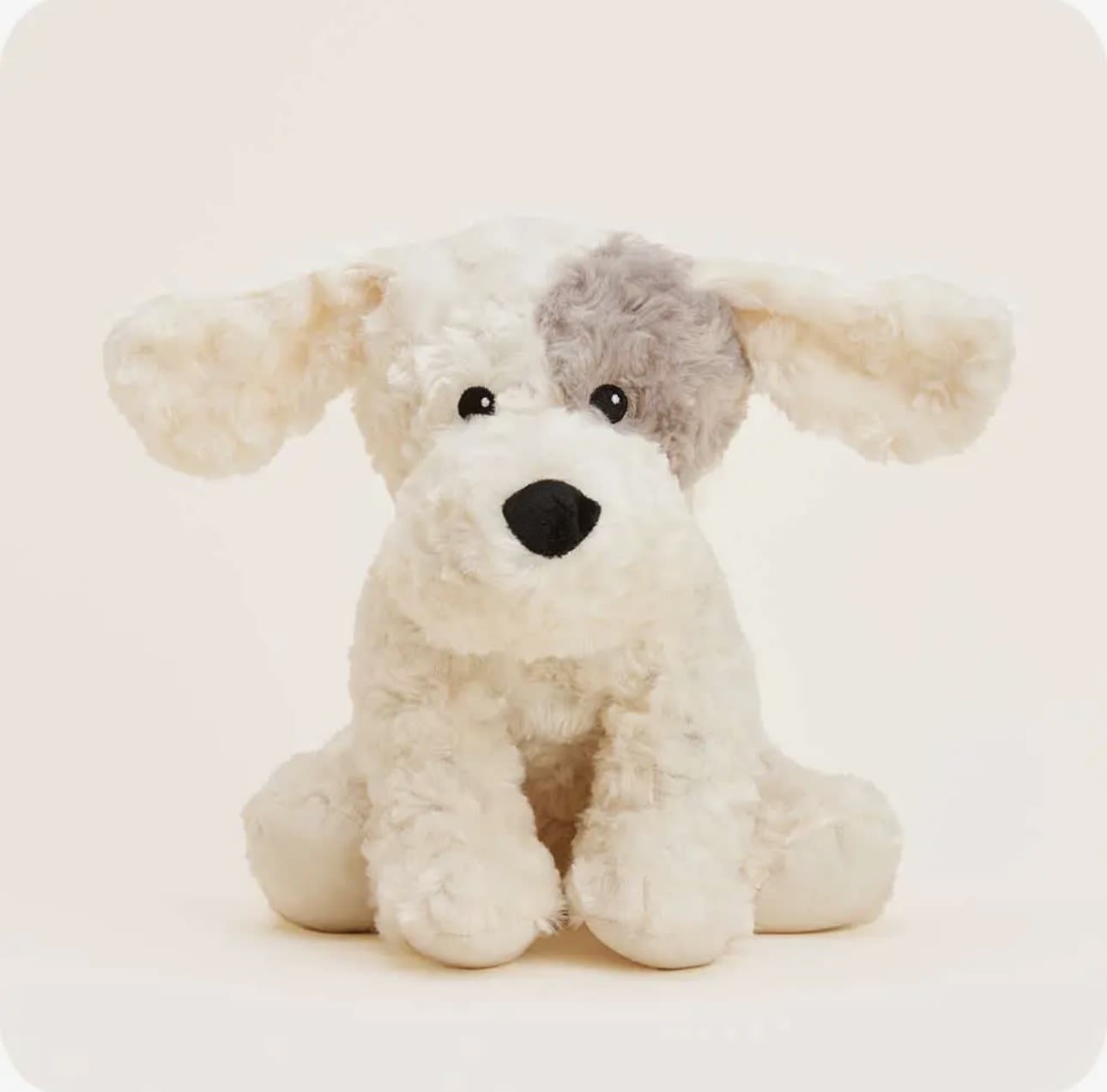 Patch Curly Dog - Warmies® Large Plush are fully microwavable to provide hours of soothing warmth and comfort. These adorable soft toys are scented with real dried French lavender and perfectly weighted for a positive sensory experience. Warmies make an ideal gift for all ages.   Quick Facts:  * Simply Warm in a Microwave   * Soothes, Warms and Comforts   * Scented with Real French Lavender   * Chill in a Freezer for Cooling Relief   * Safe for all Ages   * Dimensions: 11”x6”x8"   * Weight: 2.0lbs