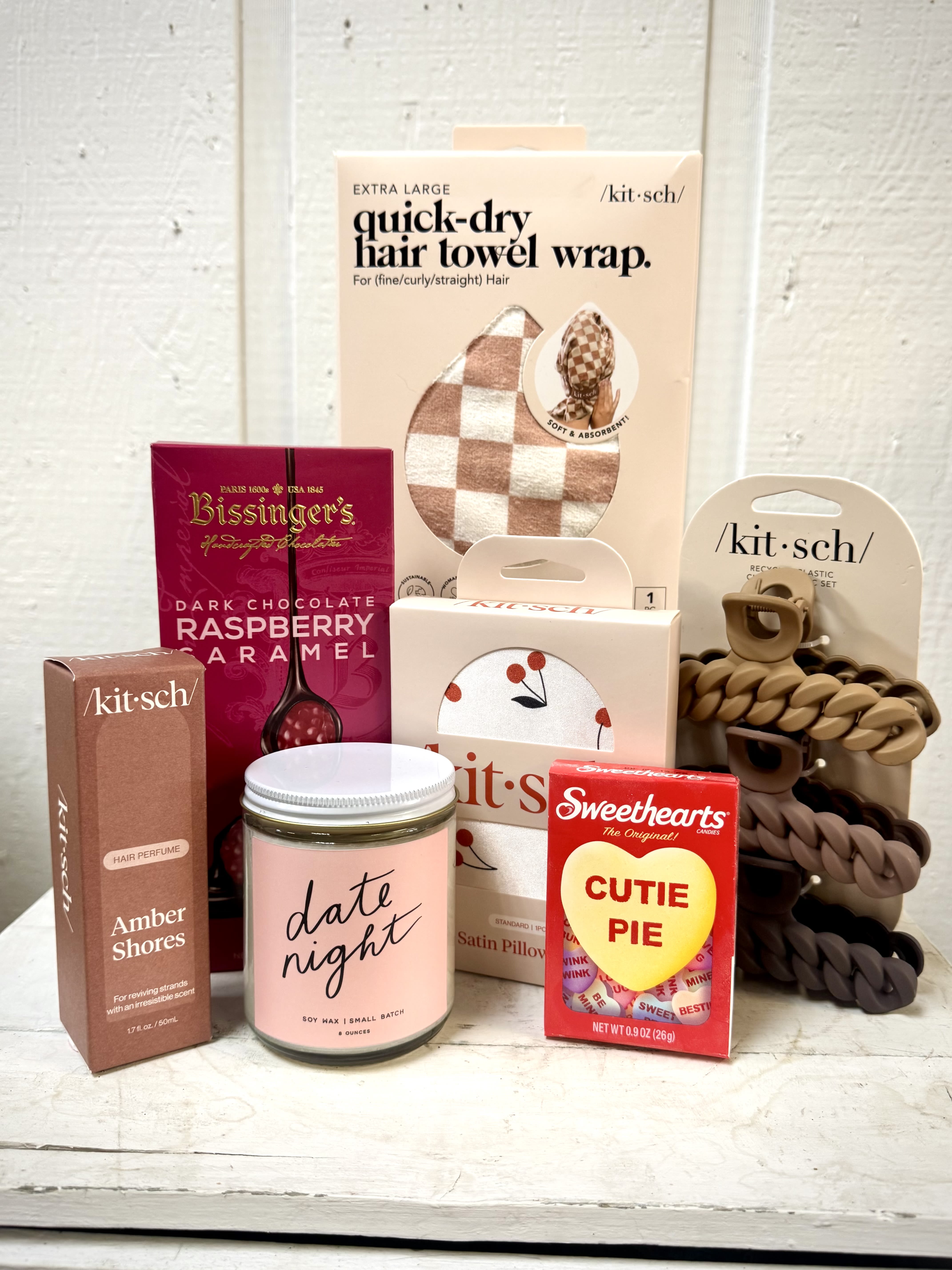 Kitsch Hair Care Kit - Quick dry hair towel, Raspberry chocolate bar, silk pillow case, chocolate colored hair clips, amber shores perfume, date night candle and a sweet treat.