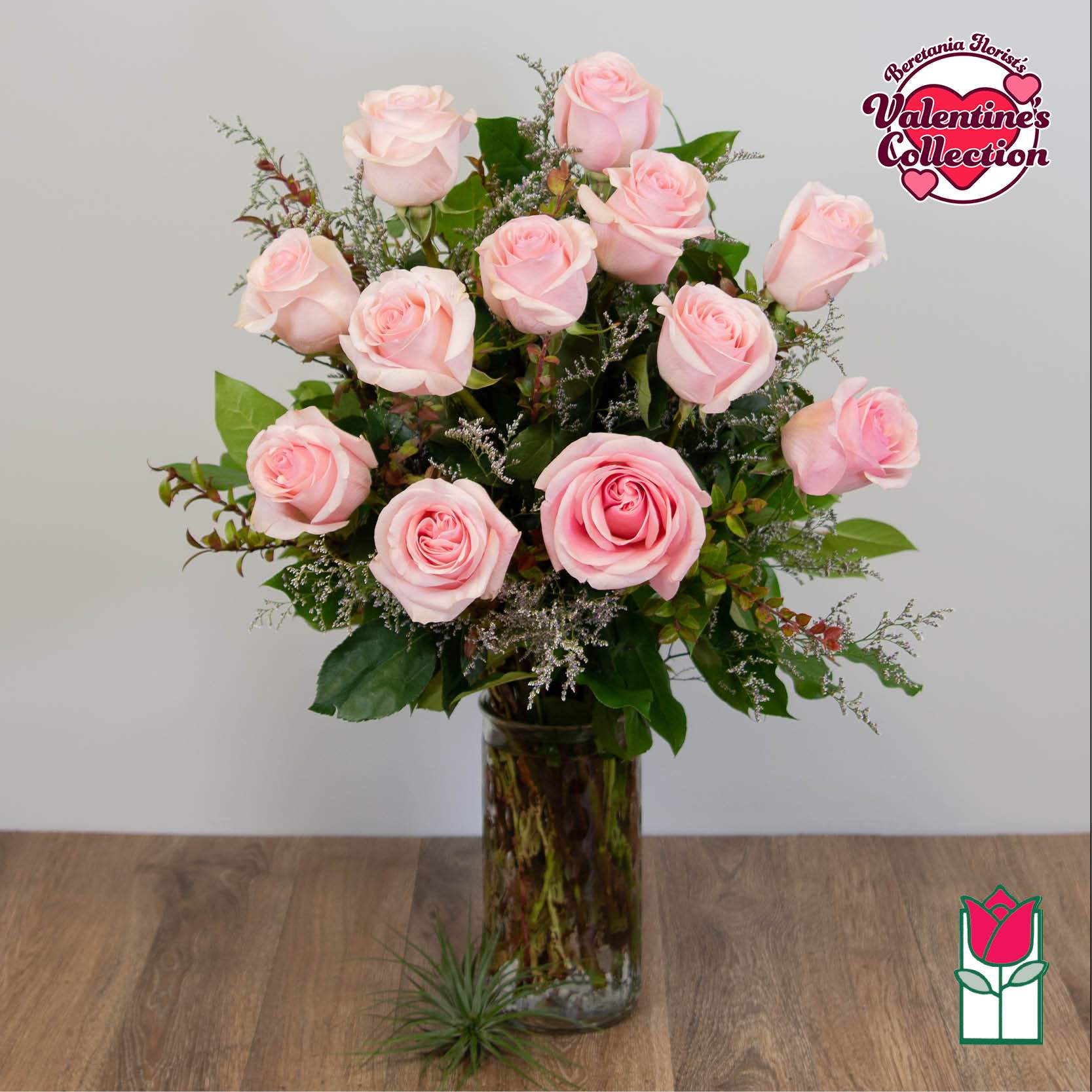 [Valentine's] Beretania's Premium Pink Rose Masterpiece (30% Larger flower) Pink Hue May Vary) -  1 Dozen Premium Long Stem Pink Roses  The Beretania Florist one dozen extra long stem premium Roses arranged in a glass vase with assorted foliage.  We feature premium 70cm Ecuadorian extra-fancy Roses, which is 30% larger than any other rose in the islands.  Nothing speaks of love so much as a bouquet of beautiful red roses. Arranged with seeded eucalyptus in a classic glass vase, this bouquet is a gift to her heart from yours.