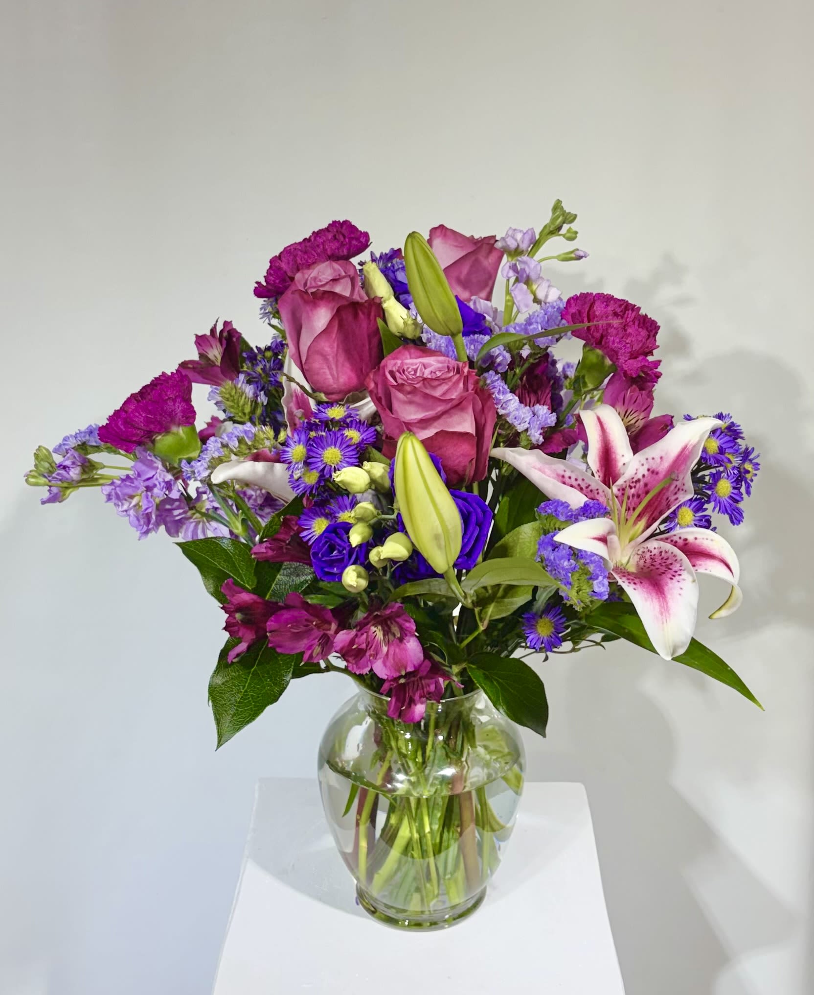 Plenty of Purple - When purple is preferred, this is sure to please. A rich mix of royal shades will be chosen for a lasting bouquet.  