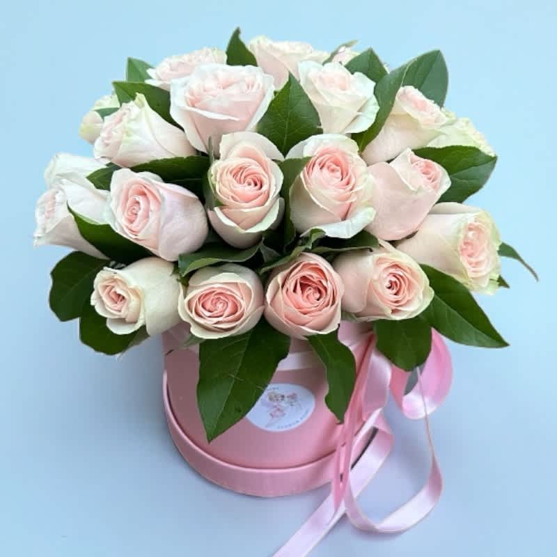 Pearl Pink Roses #45 - Behold the exquisite allure of our Two Dozens of Pearl Pink Rose Bouquet delicately arranged in a box. Each bloom embodies the essence of grace and sophistication, radiating a soft, pearl-like hue that enchants the senses. Perfect for expressing affection, gratitude, or admiration, this charming bouquet exudes understated elegance and timeless beauty. Whether adorning a tabletop or presented as a heartfelt gift, its subtle yet enchanting presence will leave a lasting impression on any recipient.