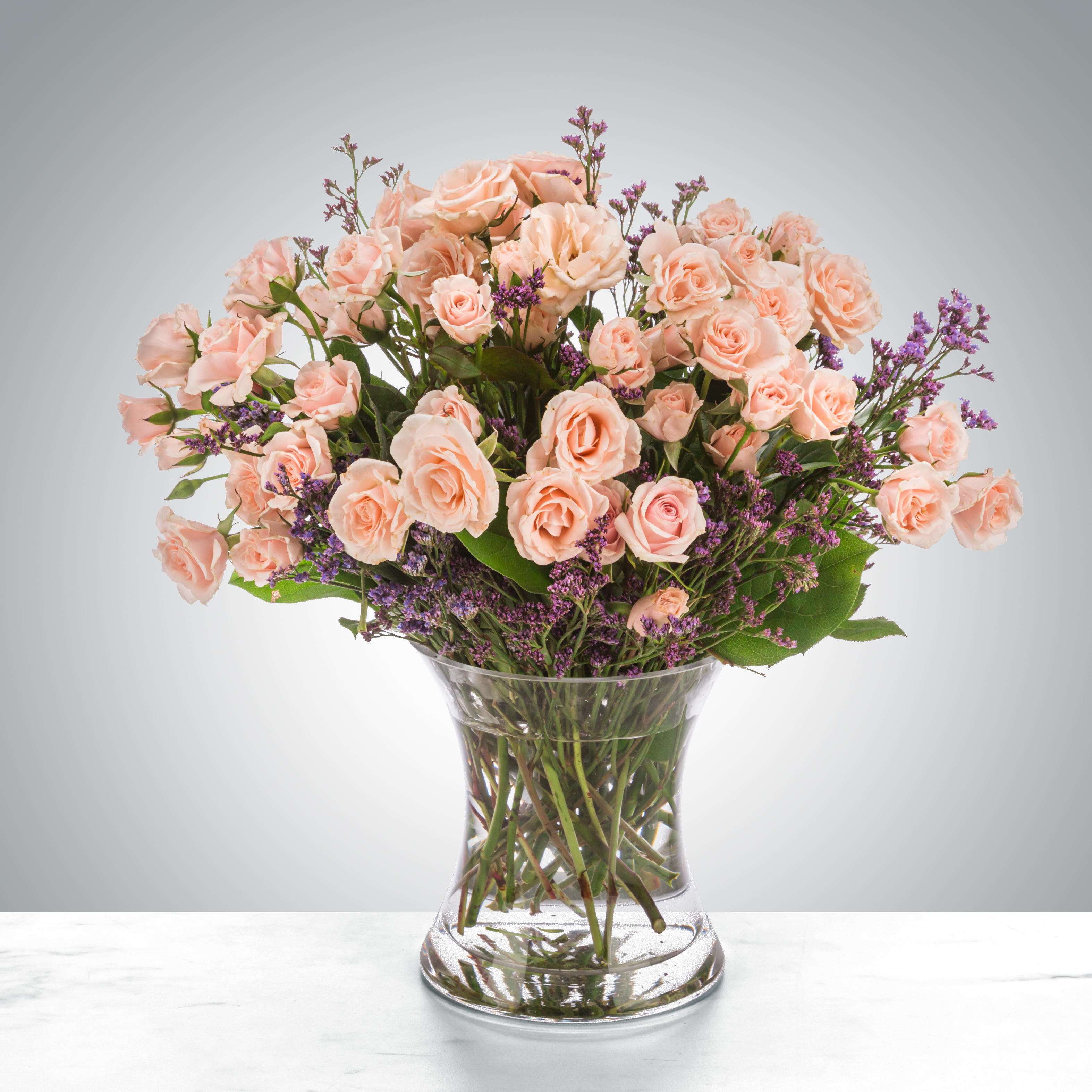 Rose Gold baby 072 - A chic twist on sending somebody the classic dozen, spray roses are a great way to say you care in a lot of ways. Send blush spray roses for Breast Cancer Awareness Month, International Women's Day, or just because.  Flower availability changes seasonally. Your arrangement may vary slightly from the photo, but we guarantee it will be fresh, full, and wild! 