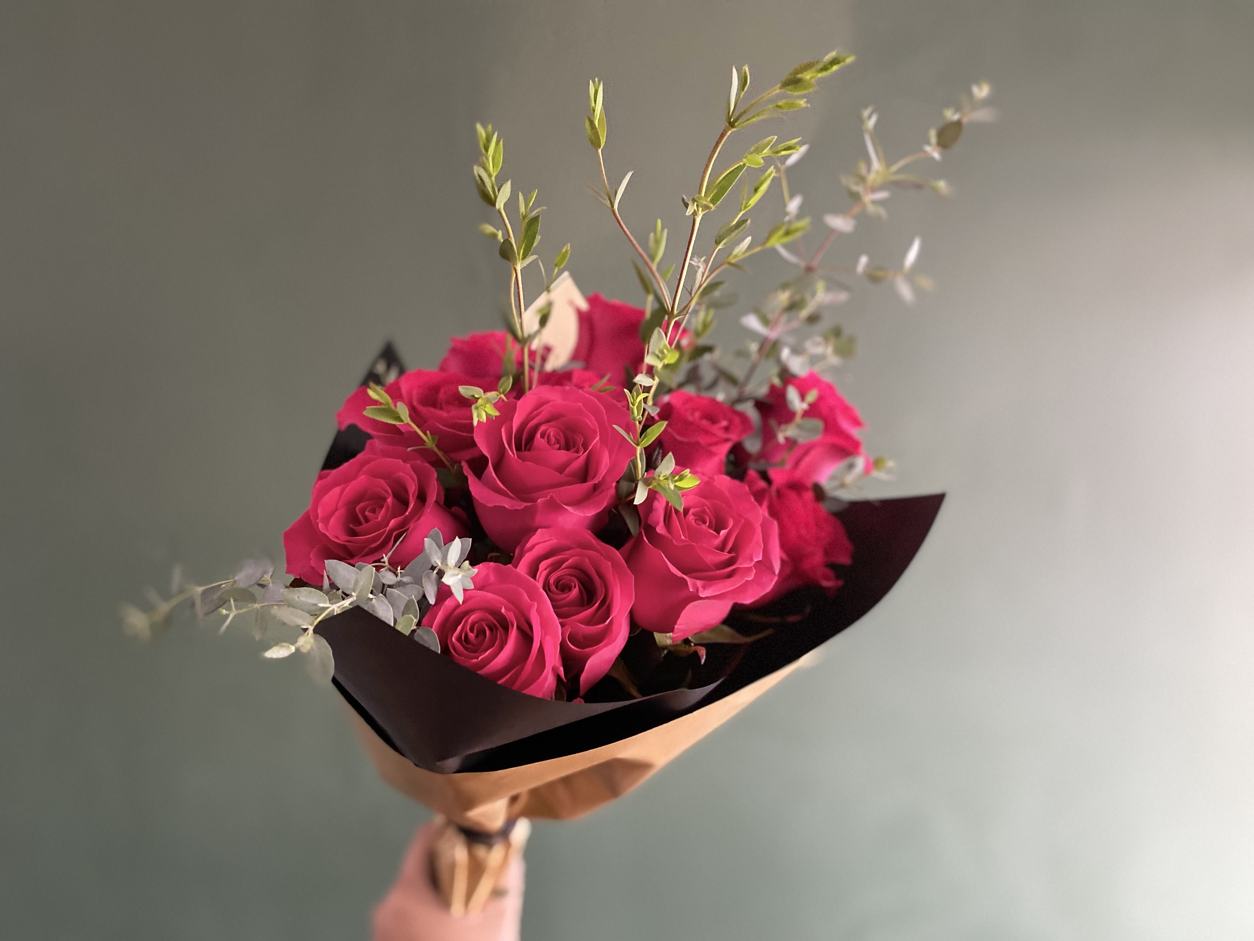 Champagne Pop!  - Beautiful celebration Bouquet or just because, filled with fuchsia roses eucalyptus and hand wrapped in a gold black paper.   