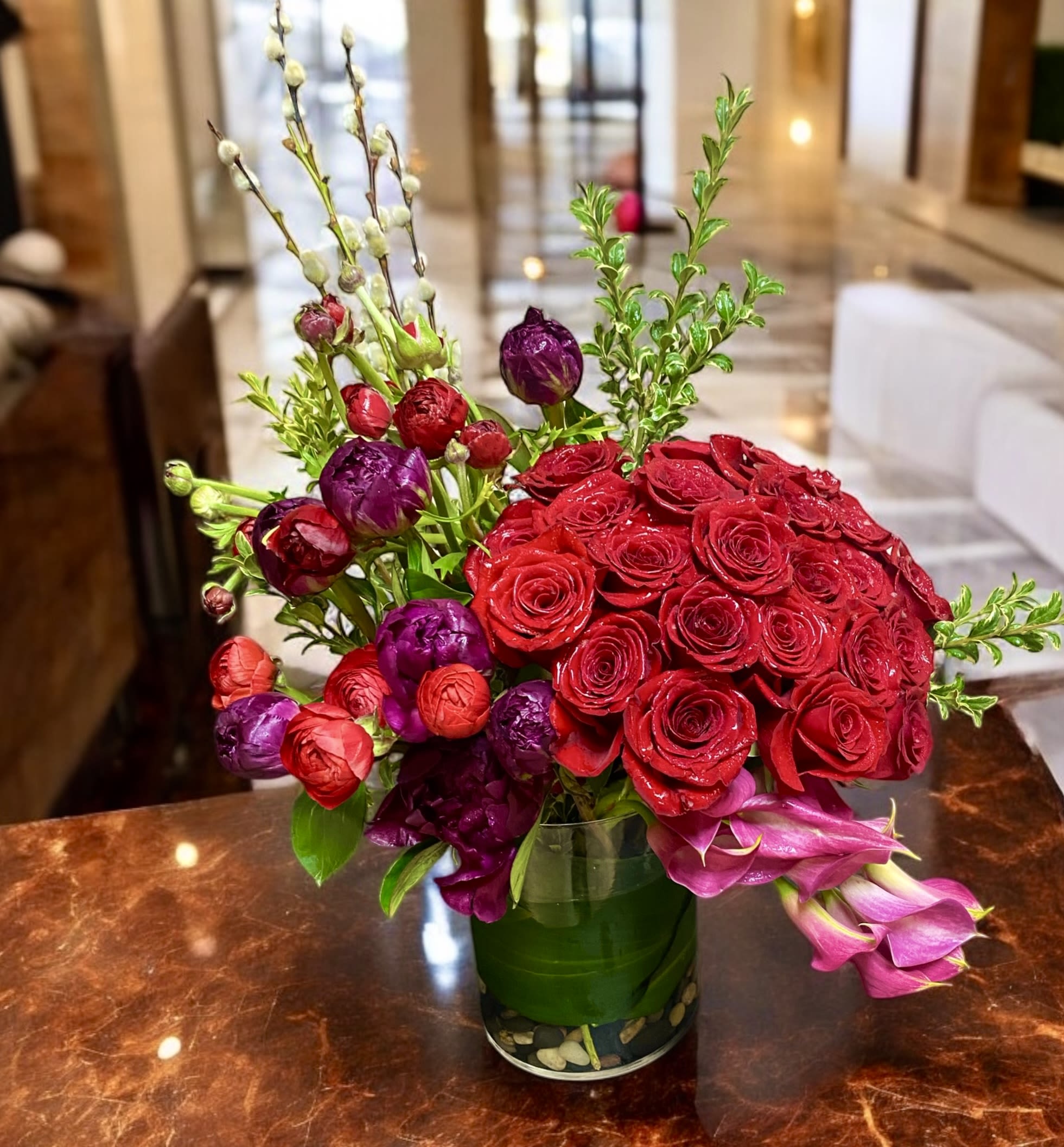 Mosaic Masterpiece - Artistically beautiful and on trend with luxury!   2dozen Roses, Peonies, Ranunculus, and Calla lilies   Most definitely a statement piece