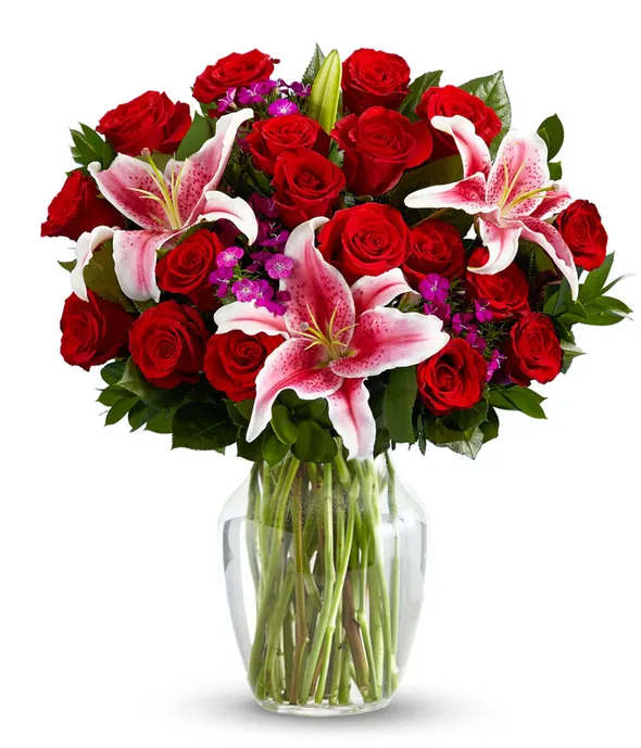 love  bouquet -  Love Bouquet" encapsulates the enduring essence of romance, making it the perfect choice for both Valentine's Day and anniversaries. With a harmonious blend of classic red roses and delicate lilies, this bouquet symbolizes everlasting love and admiration. Elevate your special moments with a heartfelt gesture that transcends time and celebrates