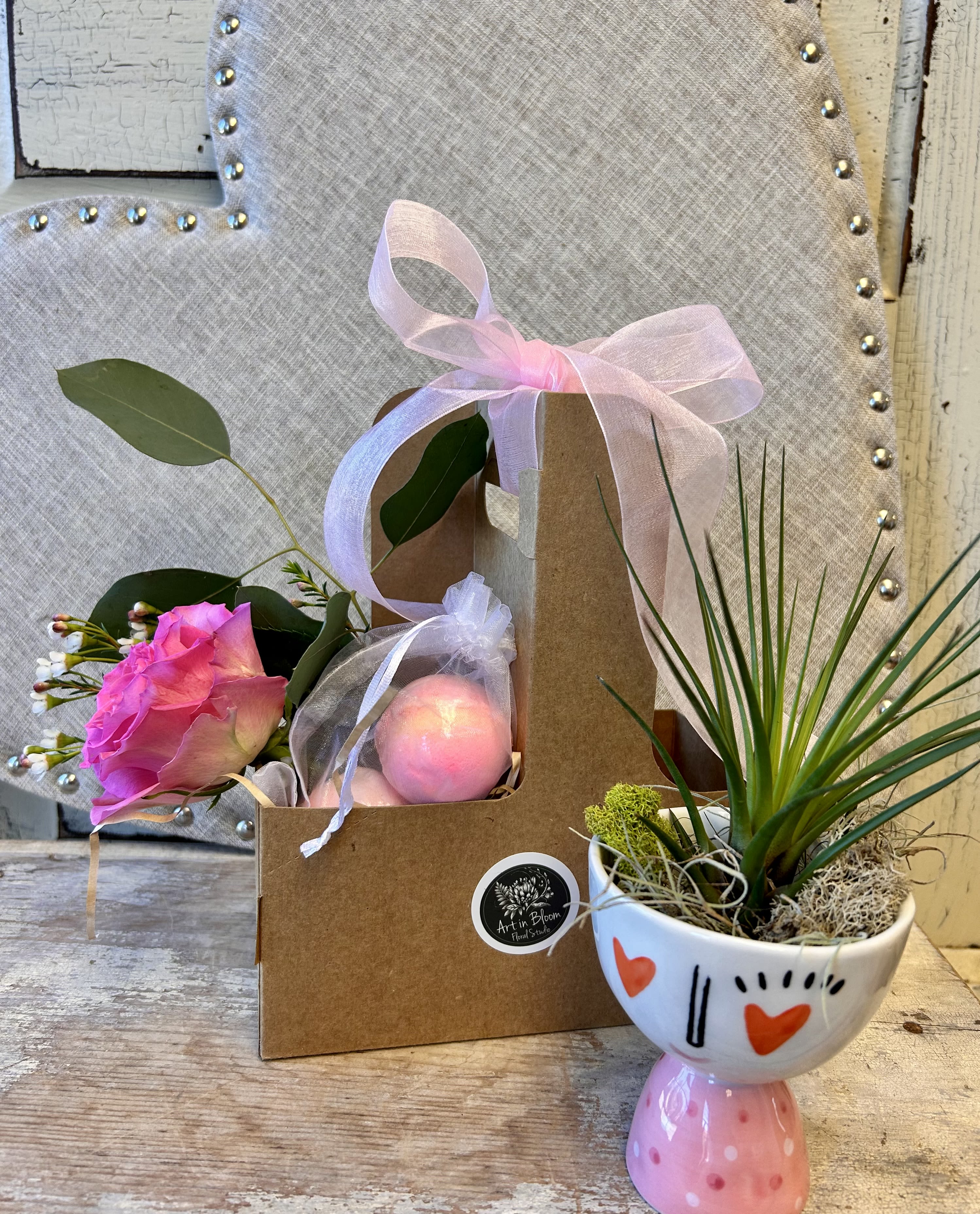Quirky Little Gift Set :) - A cardboard gift box with carrying handle contains a single pink or lavender rose, two bath bombs and an adorable ceramic container holding mosses and either an air plant or a succulent. This is bound to make someone smile!