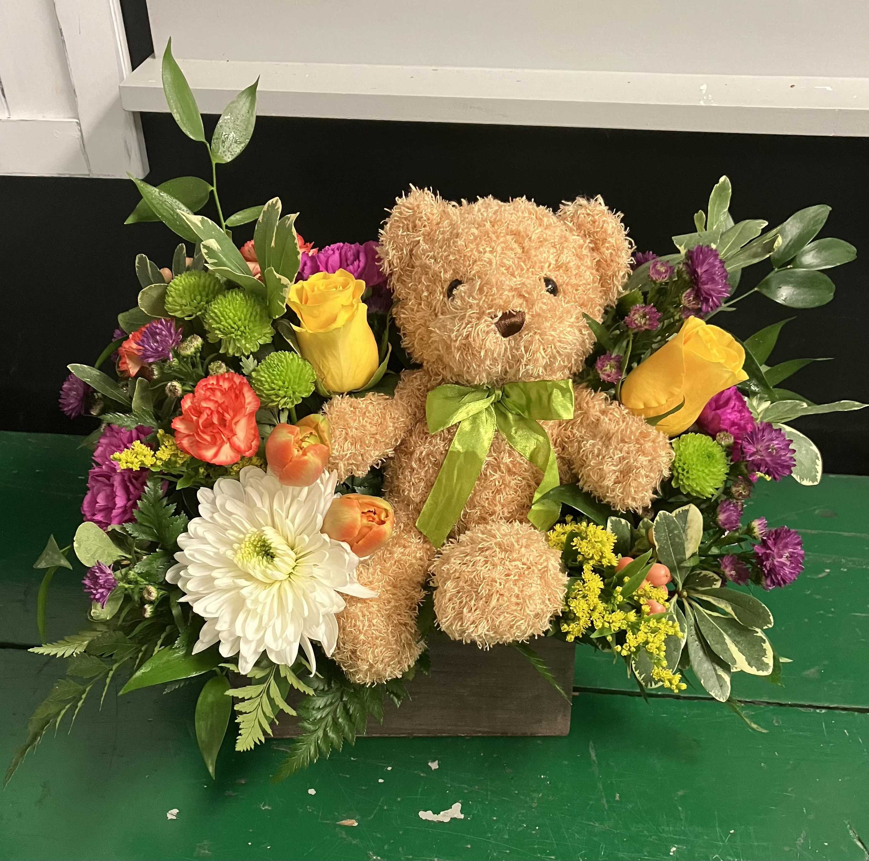 Bear-y Sweet  - A delightful mix of bright, cheerful blooms arranged in a charming wooden box, the Bear-y Sweet Bouquet is as cute as it is vibrant! Perfect for spreading joy, celebrating special moments, or simply making someone's day a little sweeter.