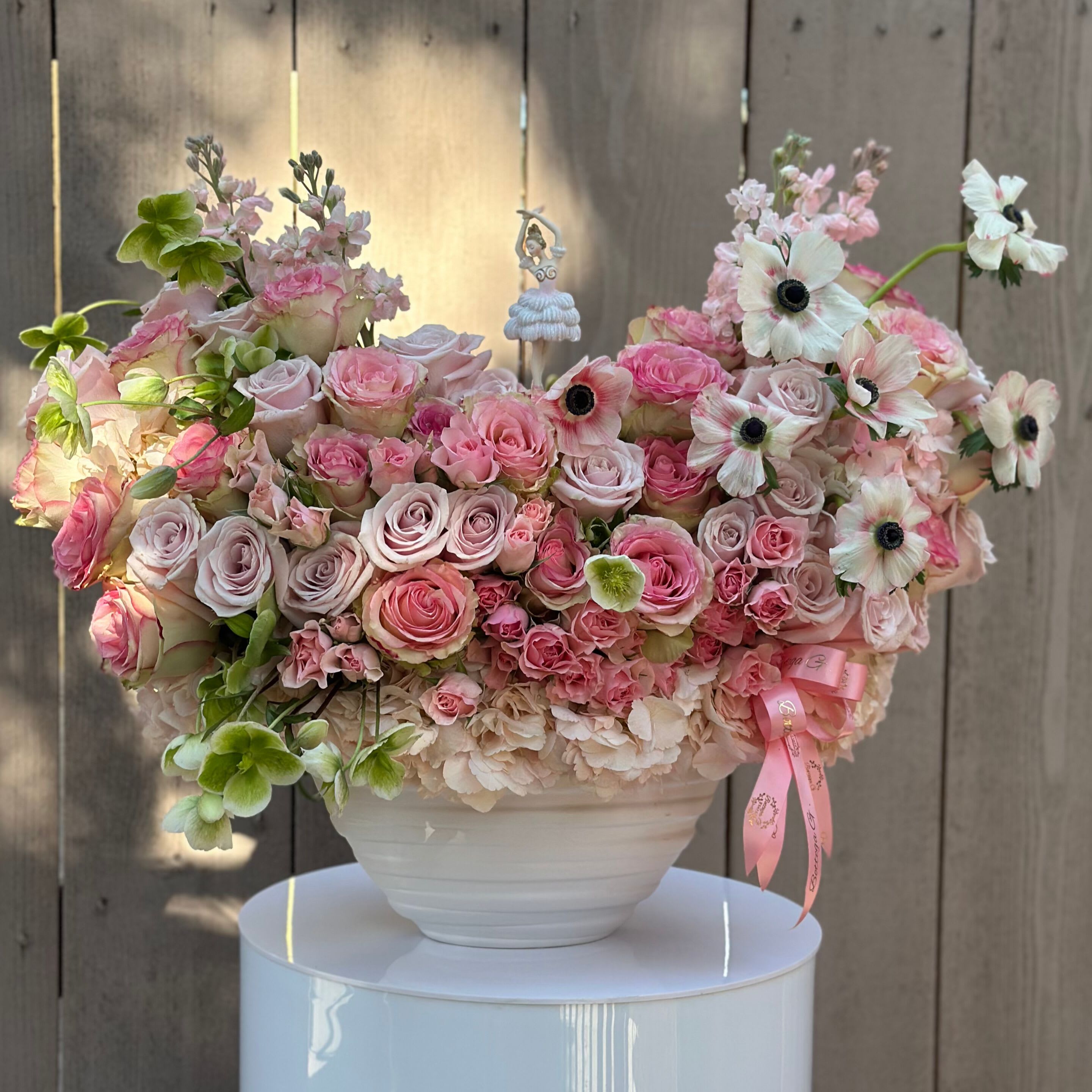Delicate Dream - A dreamy blend of soft pink and crisp white blooms, featuring lush hydrangeas, delicate anemones, and classic roses. This romantic arrangement brings together texture and elegance in perfect harmony, evoking grace and beauty with every petal. Ideal for weddings, baby showers, or thoughtful gifts, it’s a timeless expression of love and charm.