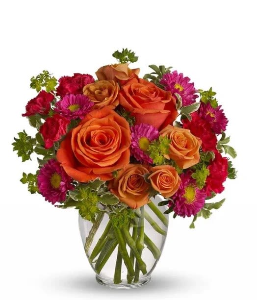 Joyfulness Bouquet - Arrangement includes orange roses, assorted red, purple/orange flowers and greenery in a glass vase.  Standard: one dozen roses Deluxe: two dozen roses Premium: three dozen roses   Includes a complimentary golden card with envelope, please send your card message with your order.