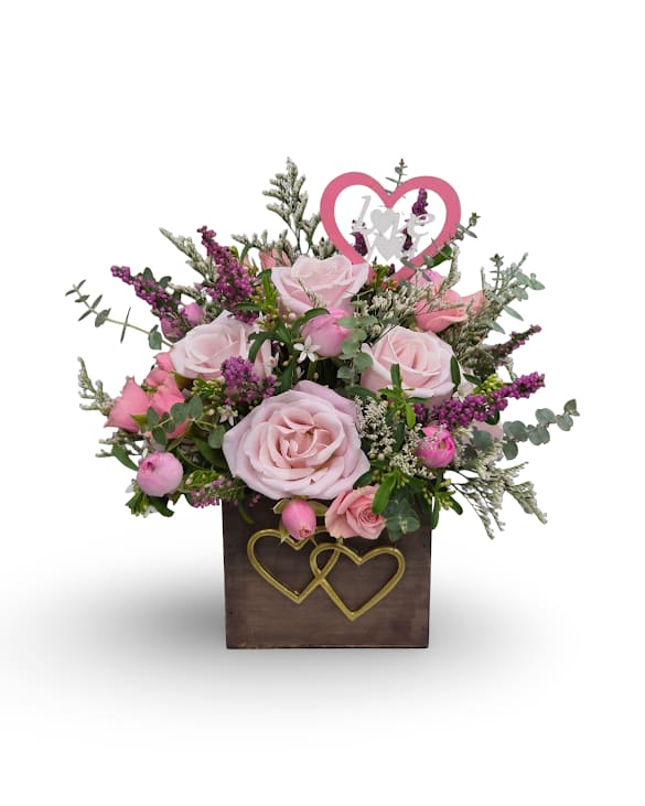 Perfectly Pink - Perfectly Pink is a sweet and charming arrangement filled with soft pink blooms and delicate accents, designed in a keepsake wooden container. Full of romantic color and gentle texture, this petite arrangement is the perfect way to share a little love and beauty. Approximate size: 12" x 11".