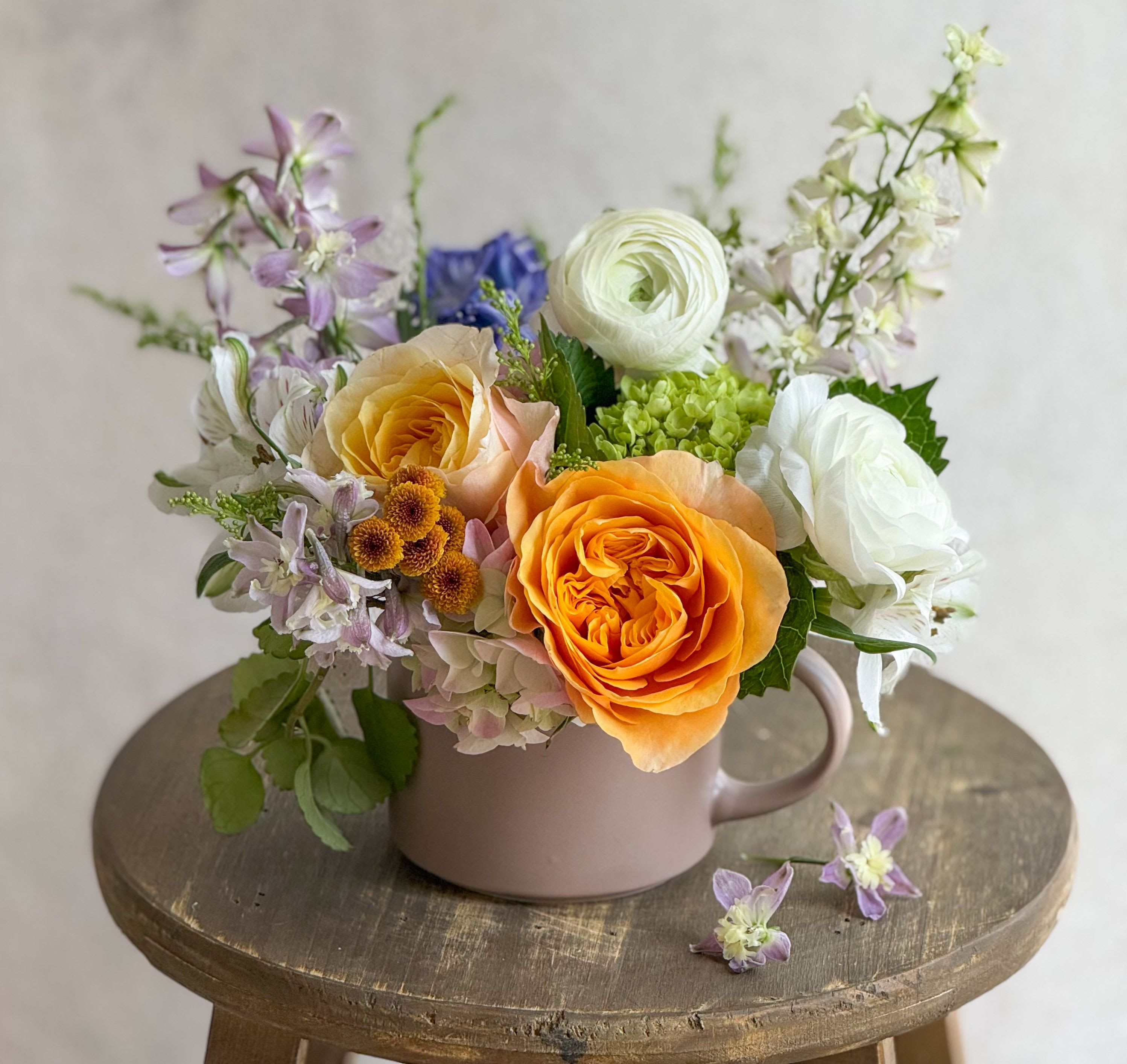 Tea Cup  - Tea Cup Arrangement with our seasonal blooms. This is the perfect gift for any occasion. 