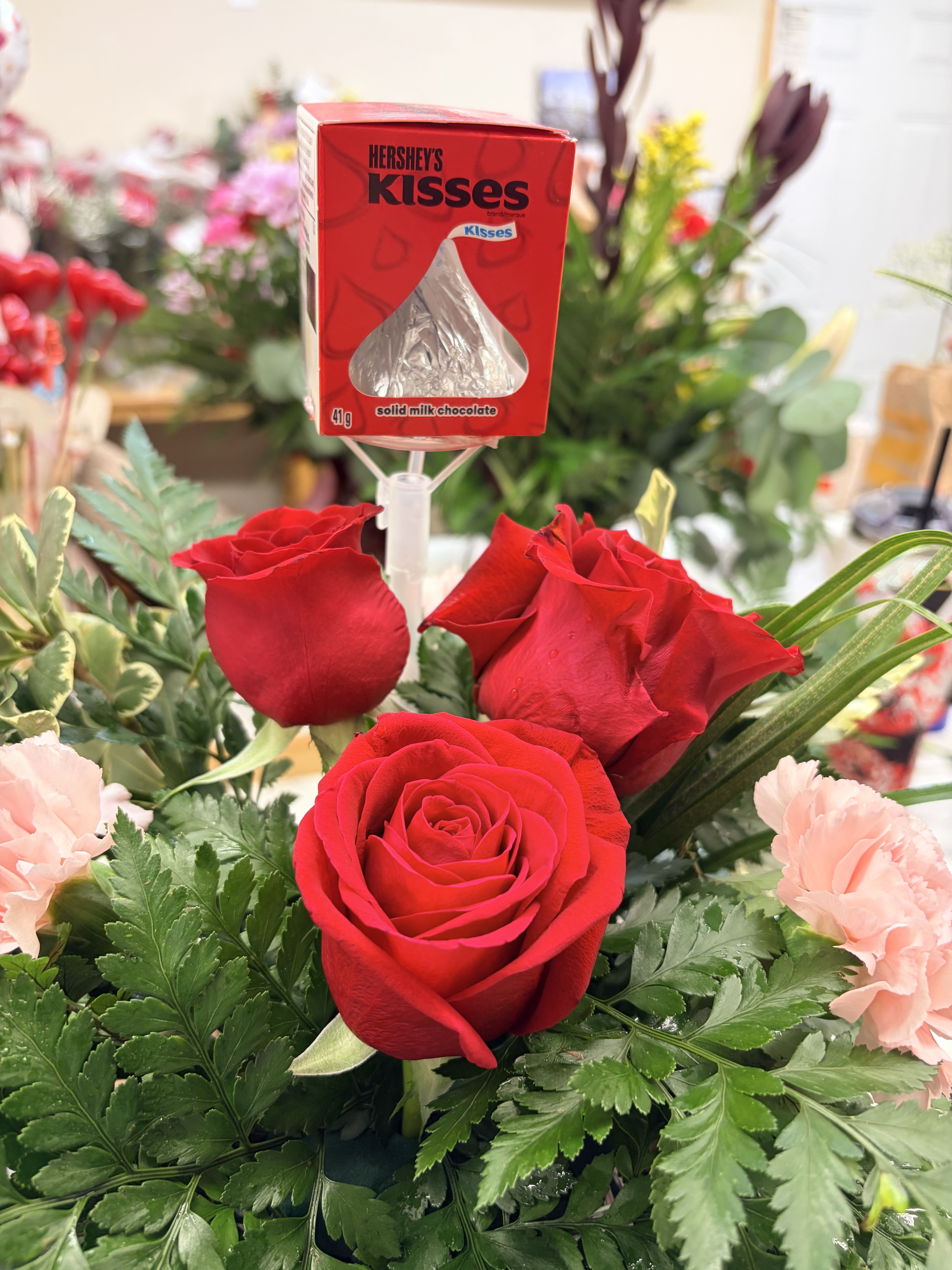 Chocolate Skewers to add to an arrangement  - Choice between Hershey Kisses or Lindor Chocolates. A little something sweet to top any arrangement.   