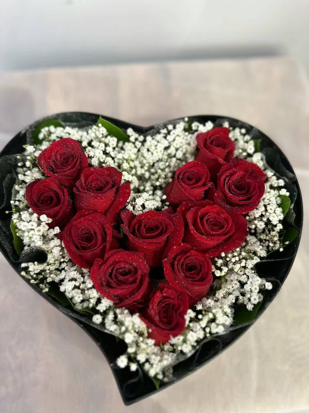 Stunning Heart Roses Box  - Freedom red roses in heart-shaped box in 2 sizes. Standard: 12 roses w/ fillers, Deluxe: 18 roses w/ fillers  Please contact us for any color changes.