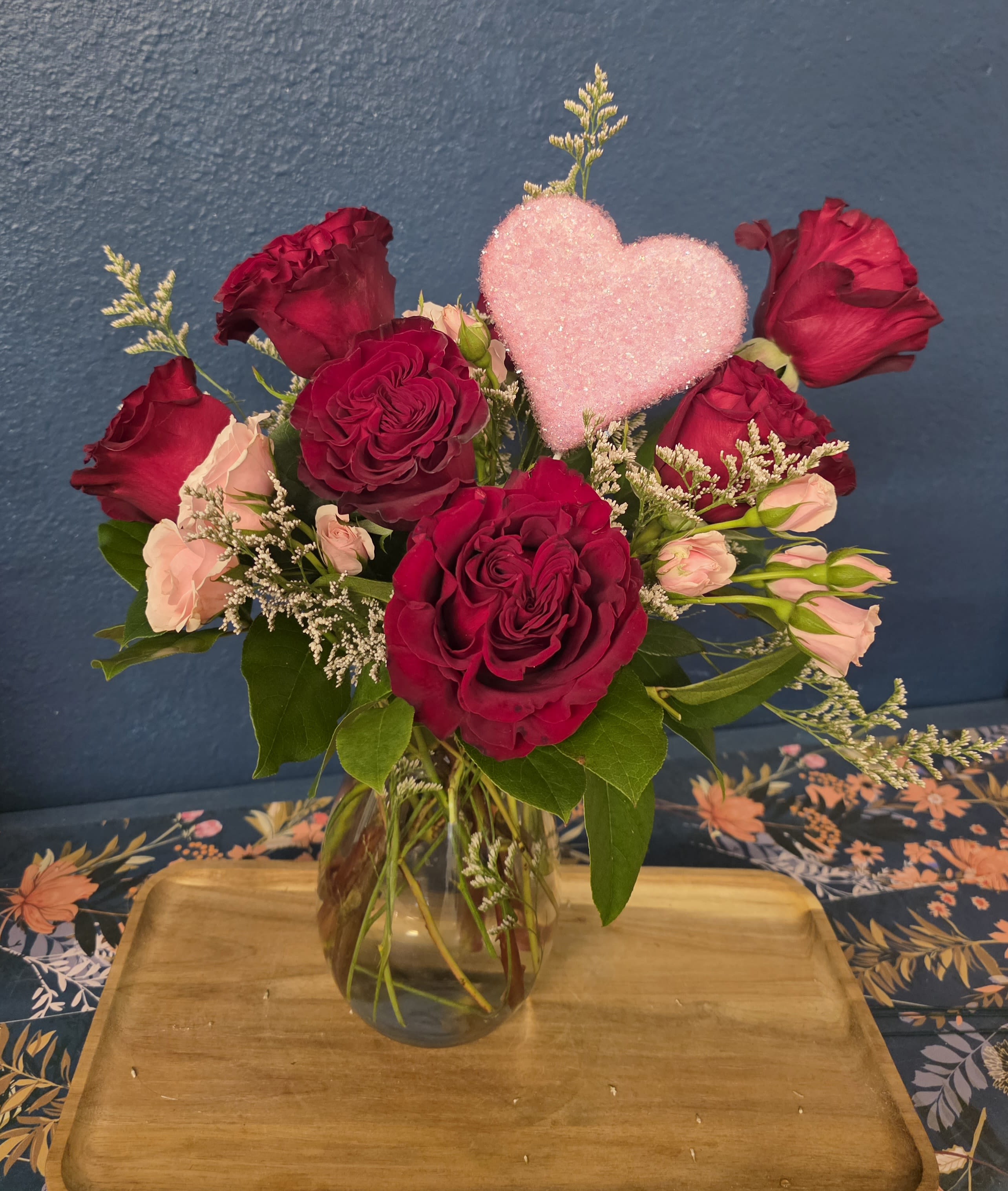 Luck in Love - 7 lucky garden roses with light pink spray roses, filler and a sparkling heart. Show your significant other that you're so lucky to have them this Valentine's Day!