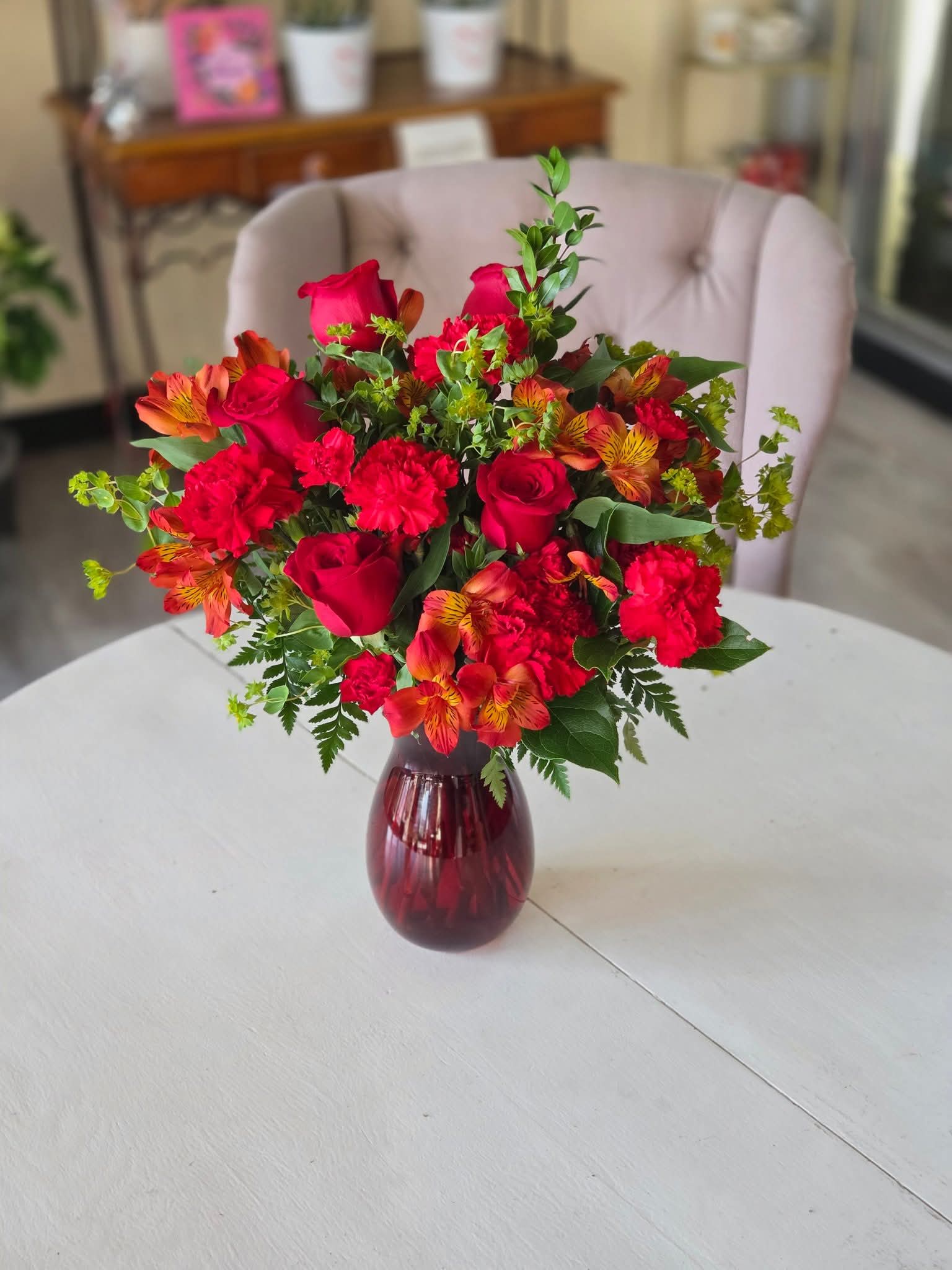 Bold Elegance  - Fiery reds and oranges set this arrangement apart from all others! 