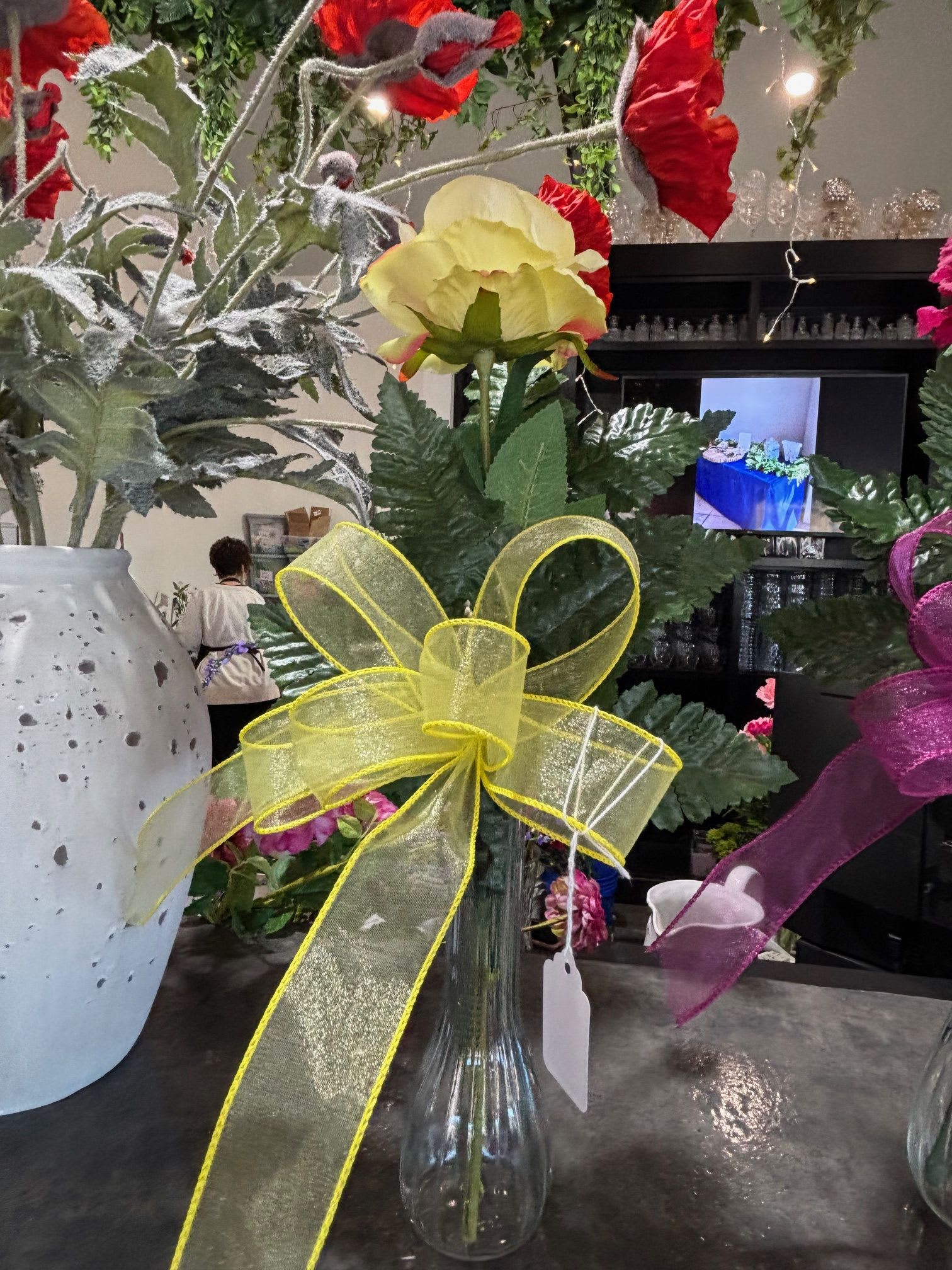 Single Artificial Yellow Rose Budvase - A delicate artificial single rose in a classic bud vase, perfect for a sweet, lasting decorative touch.