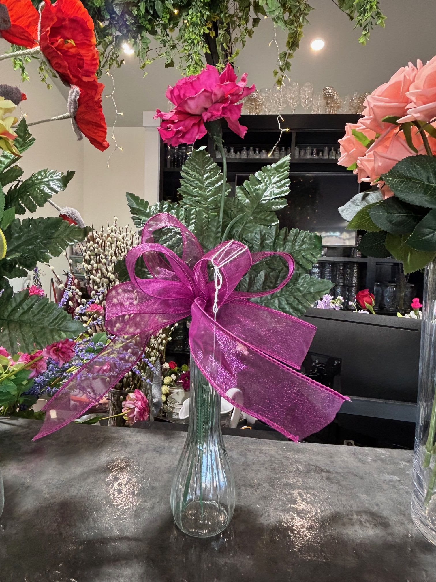 Hot Pink Artificial Carnation Budvase - A vibrant hot pink carnation arranged in a bud vase — a bright and cheerful accent that adds a pop of color to any space