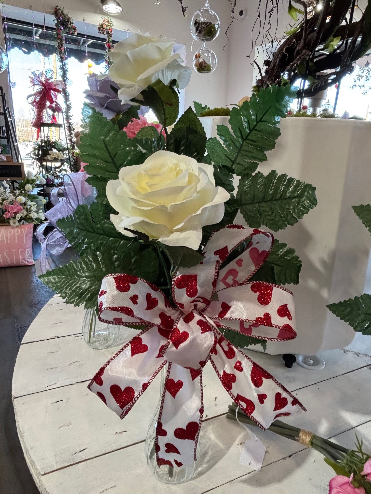 White Artificial Rose duo budvase - An artificial pair of white roses in a classic bud vase, perfect for a clean and graceful decorative touch