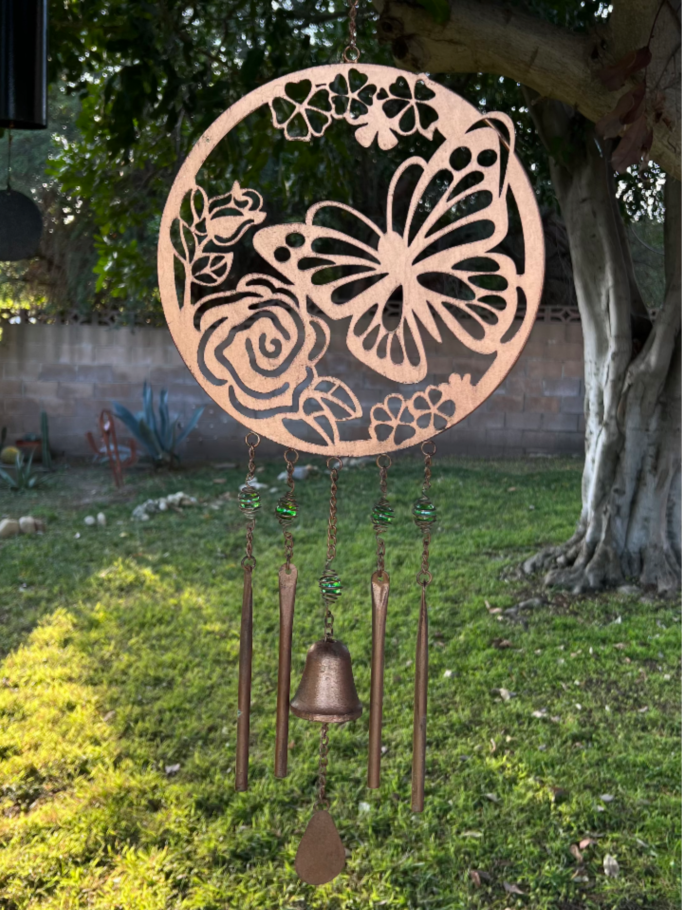 Metal Butterfly Wind Chime - Add on a beautiful bronze wind chime to your purchase. This wind chime will make a relaxing setting with its soothing sounds.