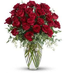  Forever Beloved - 30 Long Stemmed Red Roses  - Forever beloved. Forever in your heart. Forever close to you. That is what this beautiful rose arrangement symbolizes. A shared life. Or a shared sacred moment. All will be dignified beautifully with this loving gift of roses in a classic urn.  Roses, roses and more roses are arranged with beautiful eucalyptus and a lovely ming vase. Say it with flowers, when no words will speak the feelings in your heart.  Approximately 20" W x 24" H  Orientation: All-Around  STANDARD  •	30 LONG STEM RED ROSES  